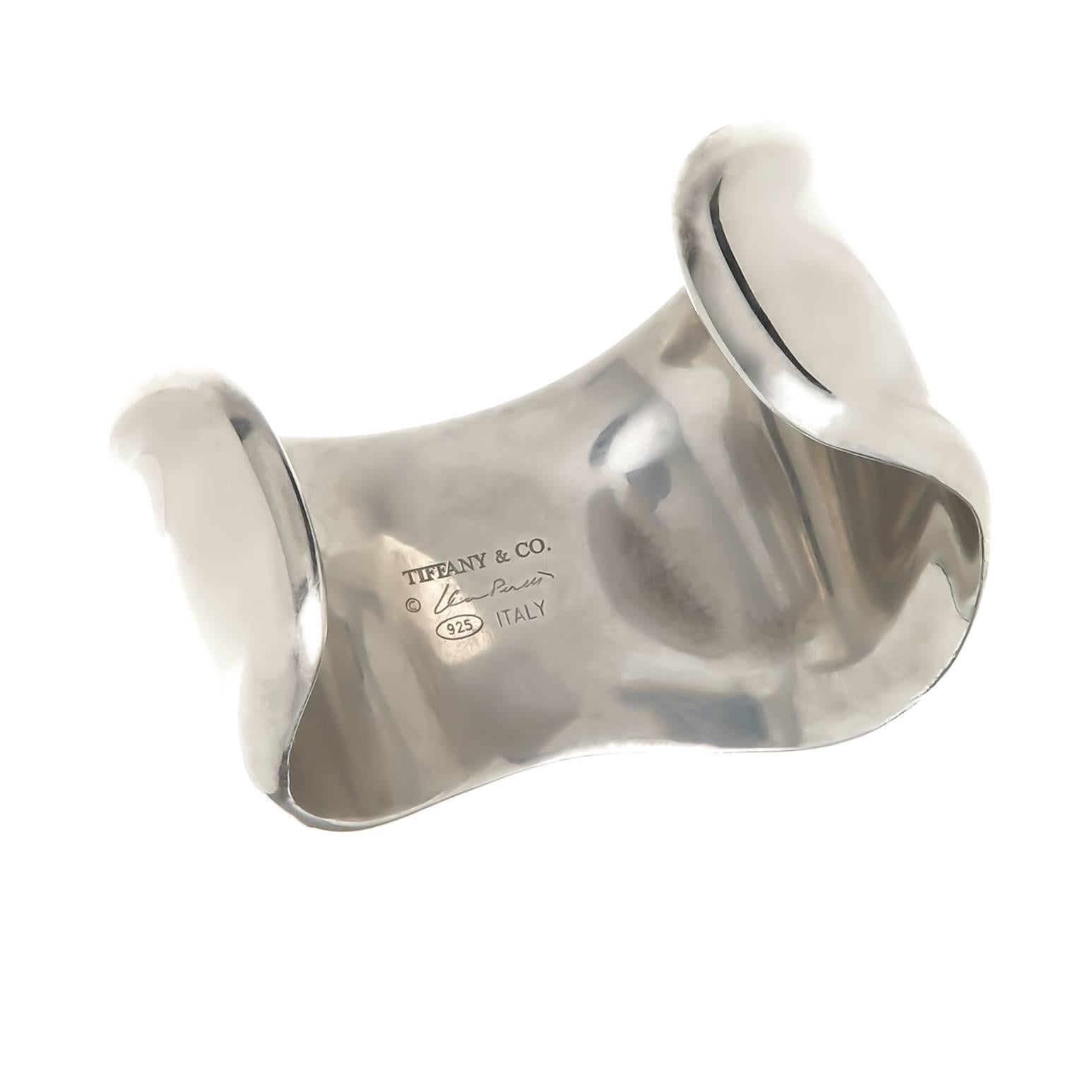 Circa 1990s Elsa Peretti for Tiffany & Company sterling silver Bone Cuff Bracelet, measuring 2 1/8 inch wide with a 1 inch opening.