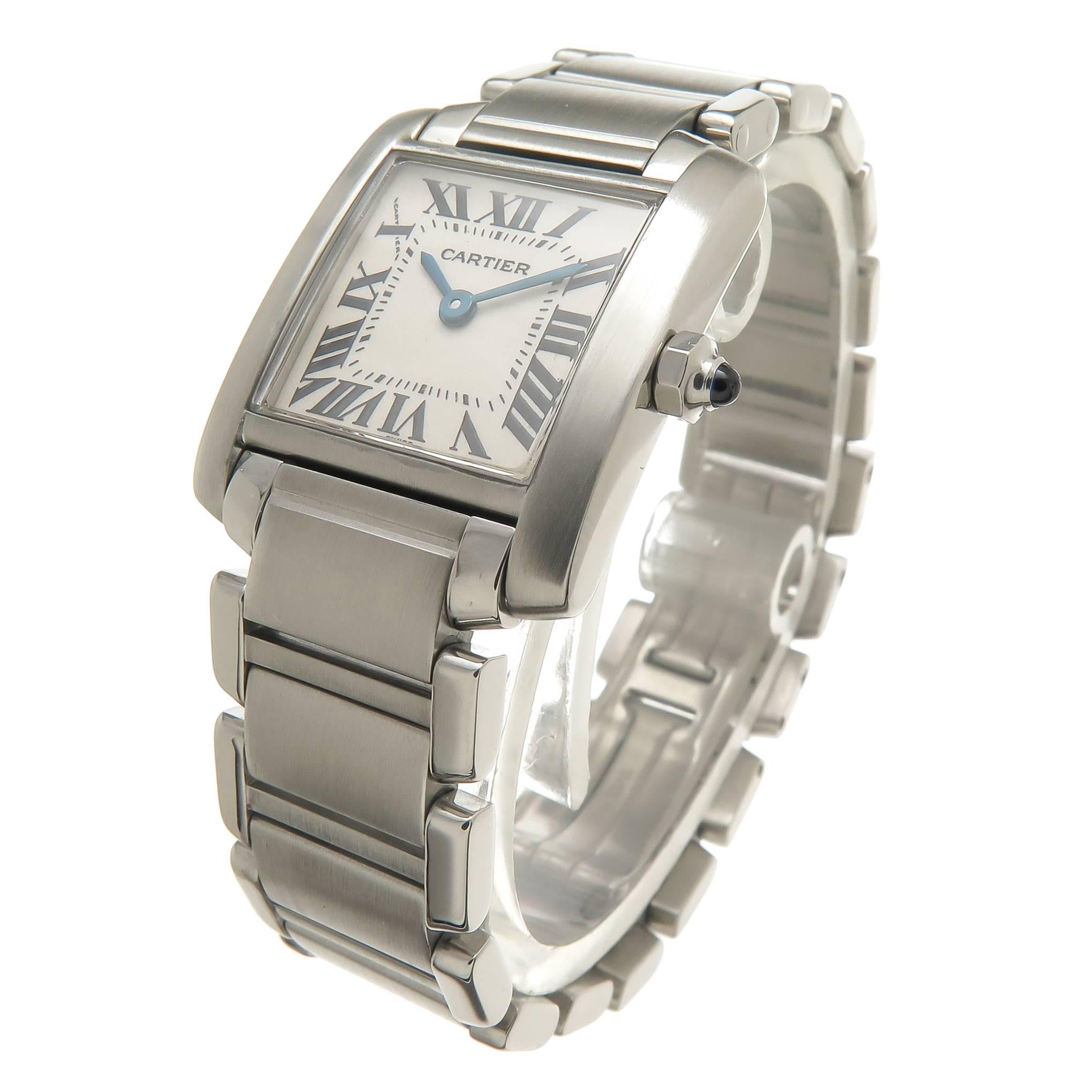 Circa 2010 Cartier Tank Francaise Wrist watch, 24 X 20 Stainless Steel water resistant Case, Quartz Movement. White Dial with Black Roman Numerals, sapphire Crown. 5/8 inch wide Steel Bracelet with deployment clasp. Total Length 6 1/2 inch.