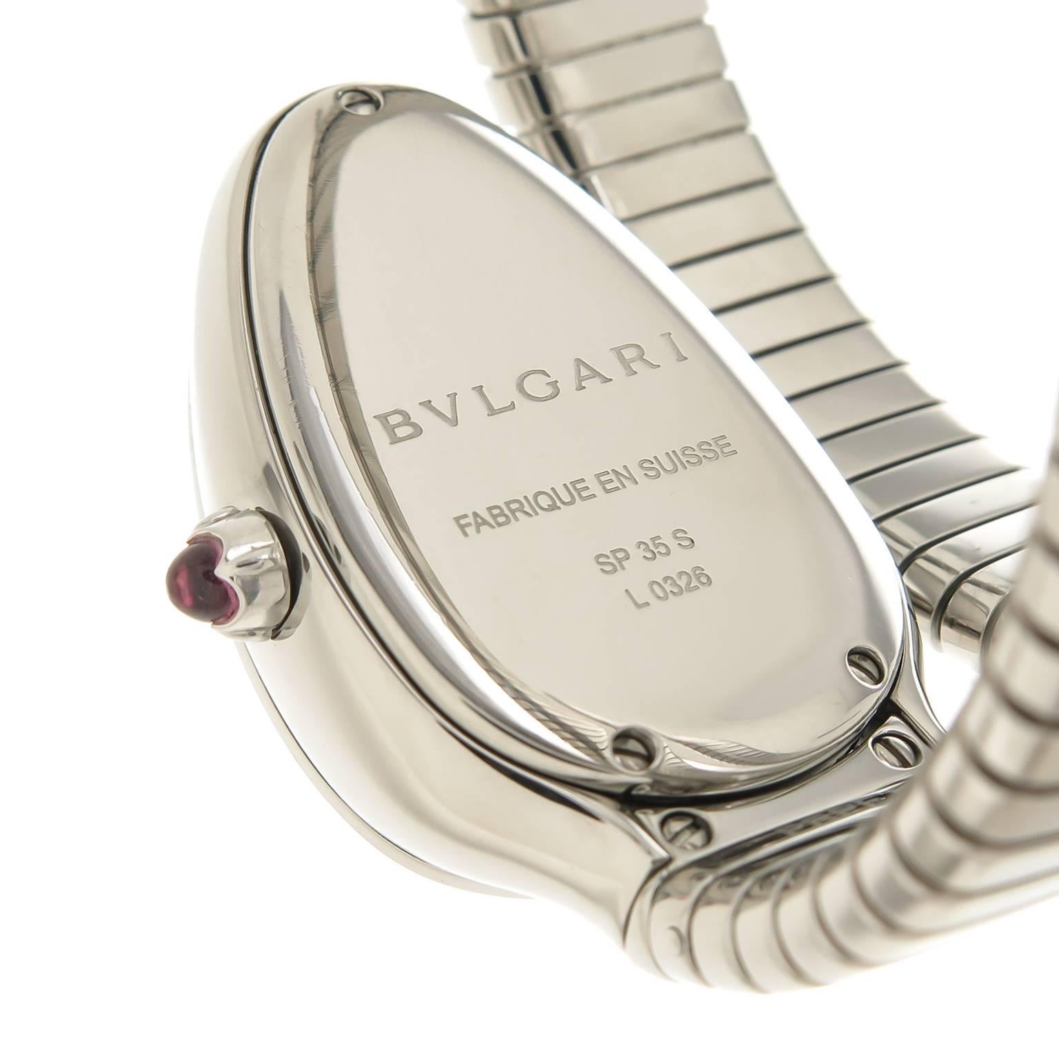 Circa 2014 Bulgari Serpenti collection Wrist Watch. Stainless Steel Tubogas flexible Bracelet. watch measures 35 MM and is 9 MM thick. Quartz movement, silver sunburst dial with raised Steel markers. Scratch resistant sapphire crystal and Pink