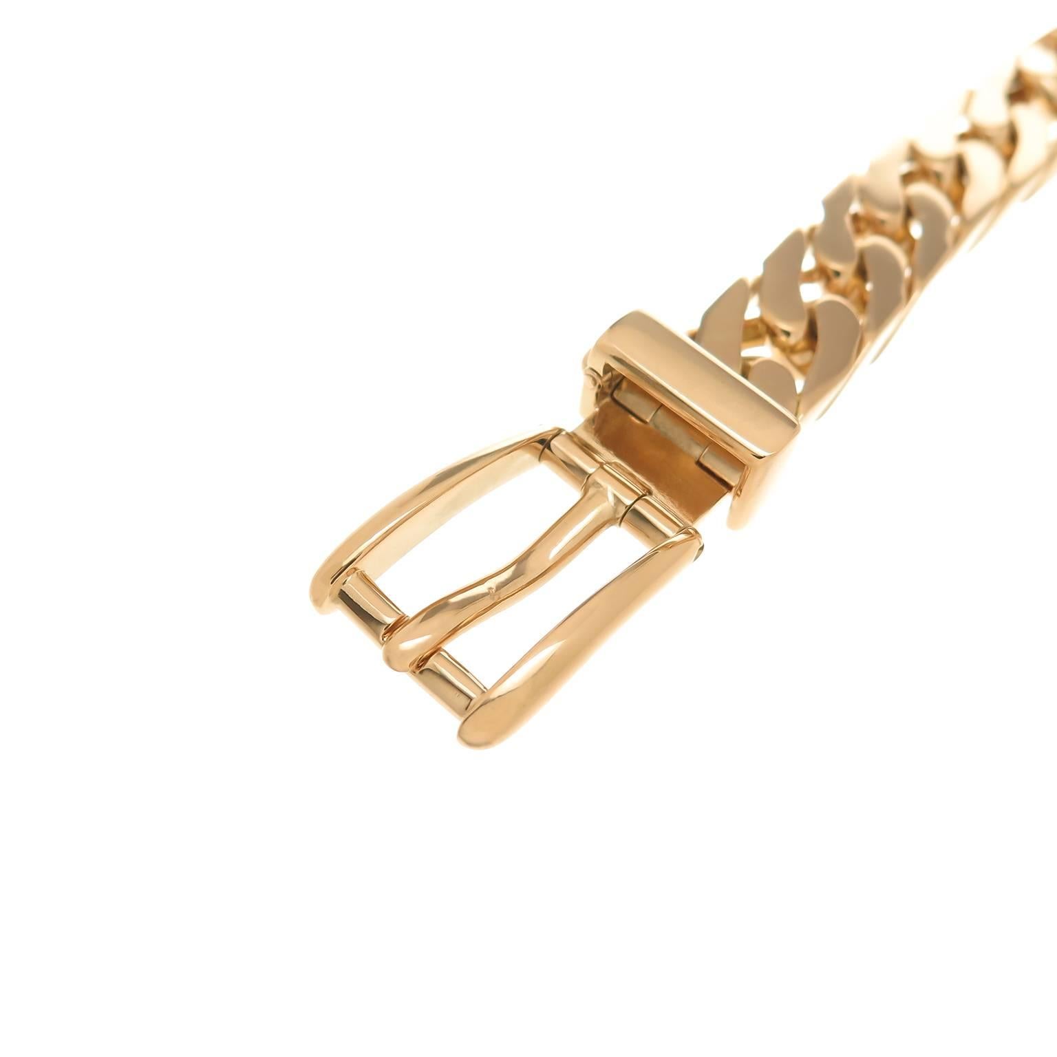 Circa 1970s Gucci 18k Yellow Gold solid Link Bracelet, with adjustable buckle style closure. Measuring 9.5 inches in length, 1/2 inch wide and weighing 110.8 Grams.