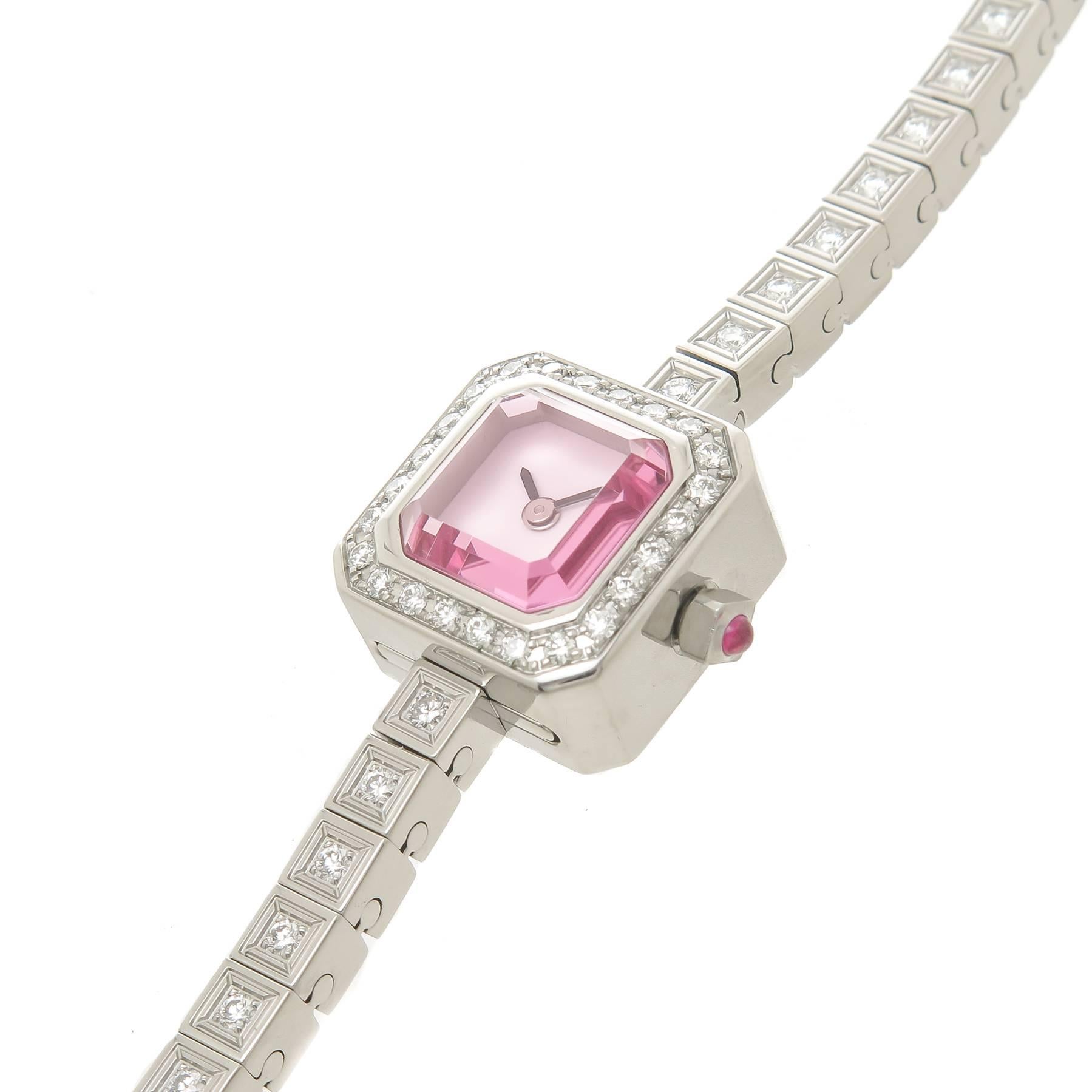 Circa 2012 Corum " Sugar Cube "  Ladies Wrist Watch, Stainless Steel Water Resistant case measuring 16 X 16 MM and 11 MM thick. Diamond set Bezel and Bracelet of Round Brilliant cut Diamonds totaling just over 1 Carat. Quartz Movement,