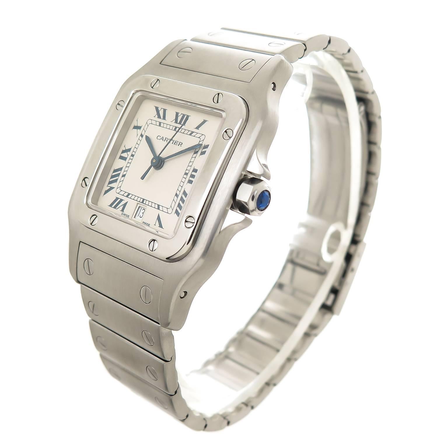 Circa 2005 Cartier Santos, 41 X 29 MM Stainless Steel water resistant case, Matt finish with high polished Bezel, quartz Movement, White Dial with Black Roman Numerals, sweep seconds hand, Calendar window at the 6, scratch resistant crystal and a