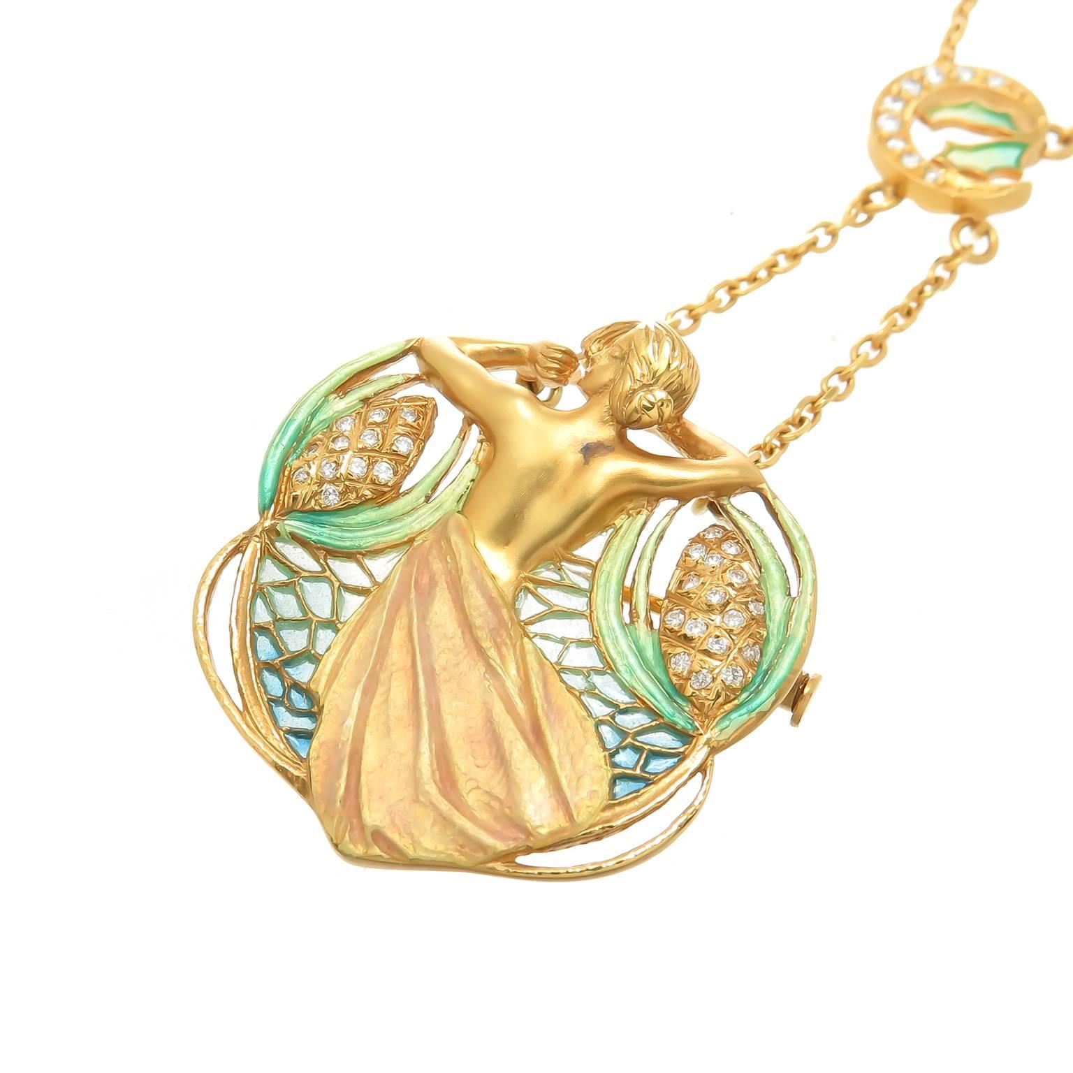 Circa 1990s Masriera of Barcelona Spain 18K yellow Gold pendant with removable chain to also be worn as a Brooch. incredible detail in the Art Nouveau style with textured and frosted gold, Plique-A-Jour Enamel and further accented with Diamonds. The