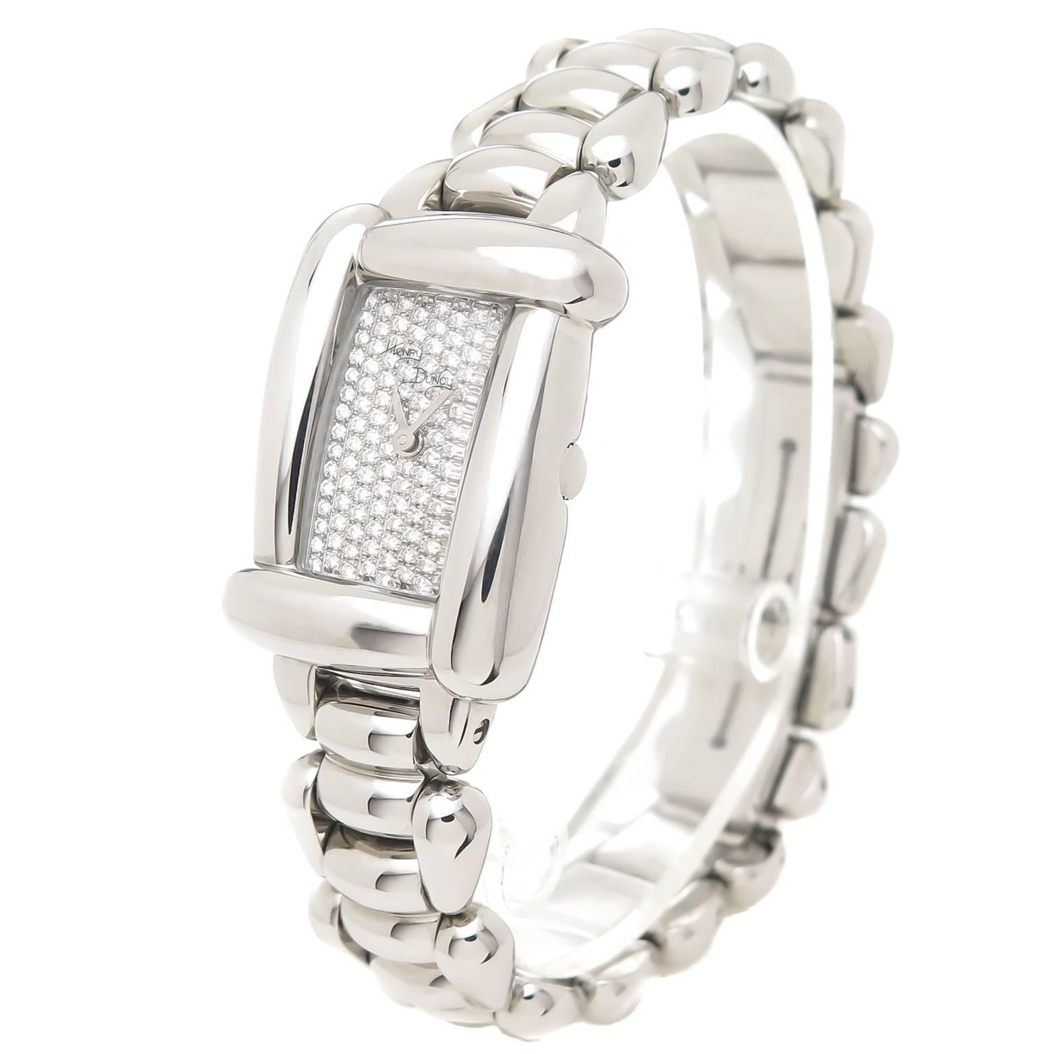 Circa 2005 Henry Dunay Medea collection Wrist Watch, 37 X 20 MM Stainless Steel water resistant case, Quartz Movement, Diamond Pave dial of round Brilliant cut Diamonds totaling approximately 1.30 Carat. 5/8 inch wide Steel link bracelet with