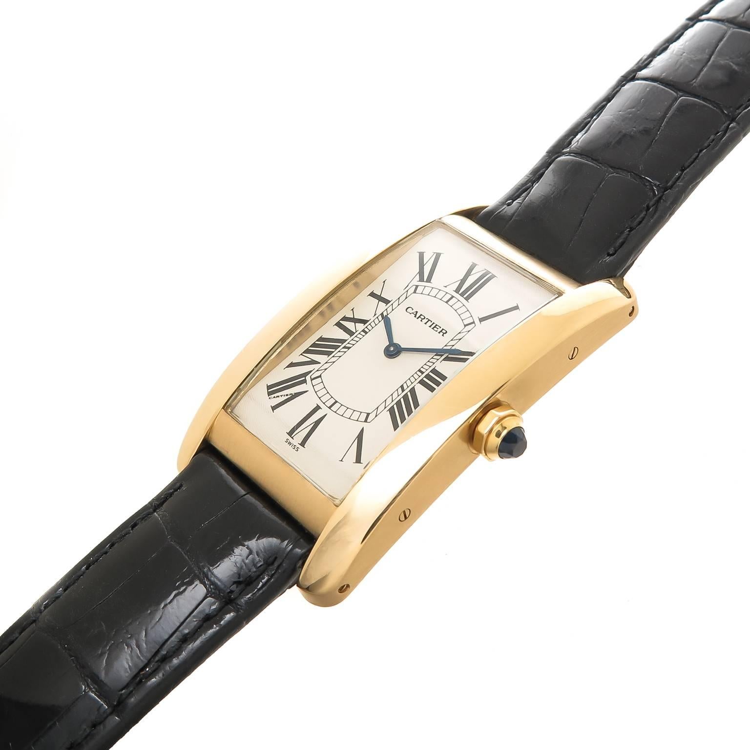 Circa 2010 Cartier Tank American Wrist Watch 45 MM 18K Yellow Gold Water resistant Case, Mechanical wind movement, white Engine turned Guilloche dial with Black Roman numerals, scratch resistant crystal and a Sapphire crown. New Black Alligator