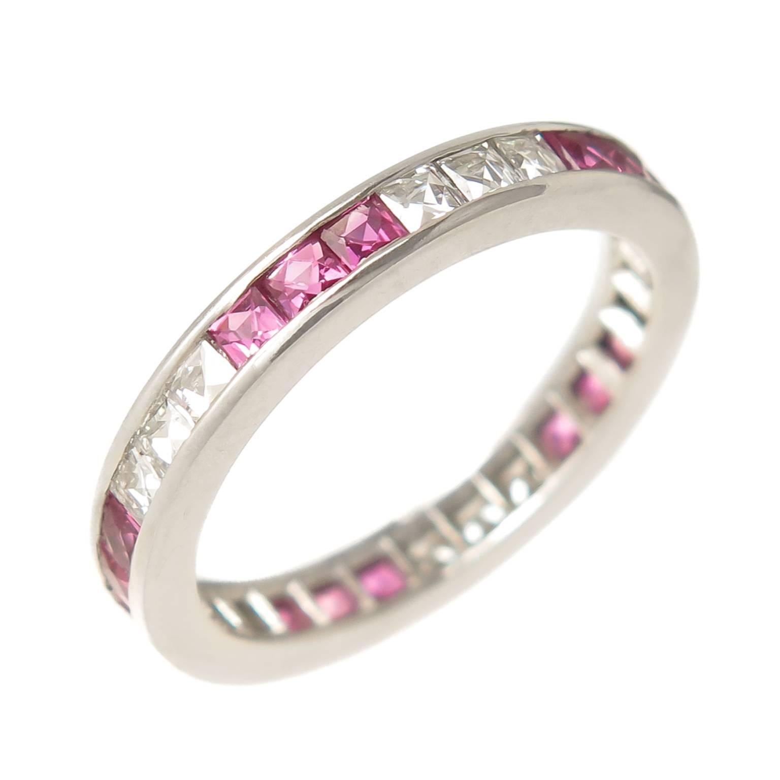 French Cut Diamonds and French Cut Rubies eternity, Band Ring set in Platinum, measuring 2.5 MM wide and set with 1/2 Carat of Diamonds and 1/2 carat of Rubies, finger size = 5