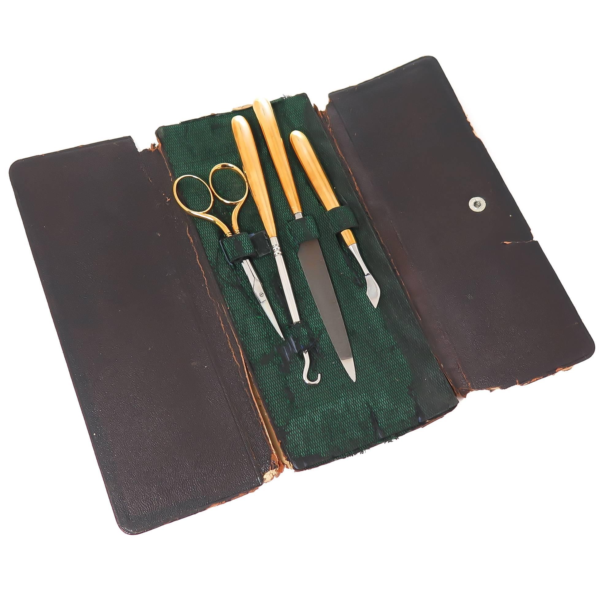 Circa 1915 14K Yellow Gold Manicure set by Gorham, this excellent condition almost unused set includes scissors, cuticle tool, nail file and button hook. each piece measuring 4 1/4 to 6 5/8 inch in length and each piece is numbered and has the