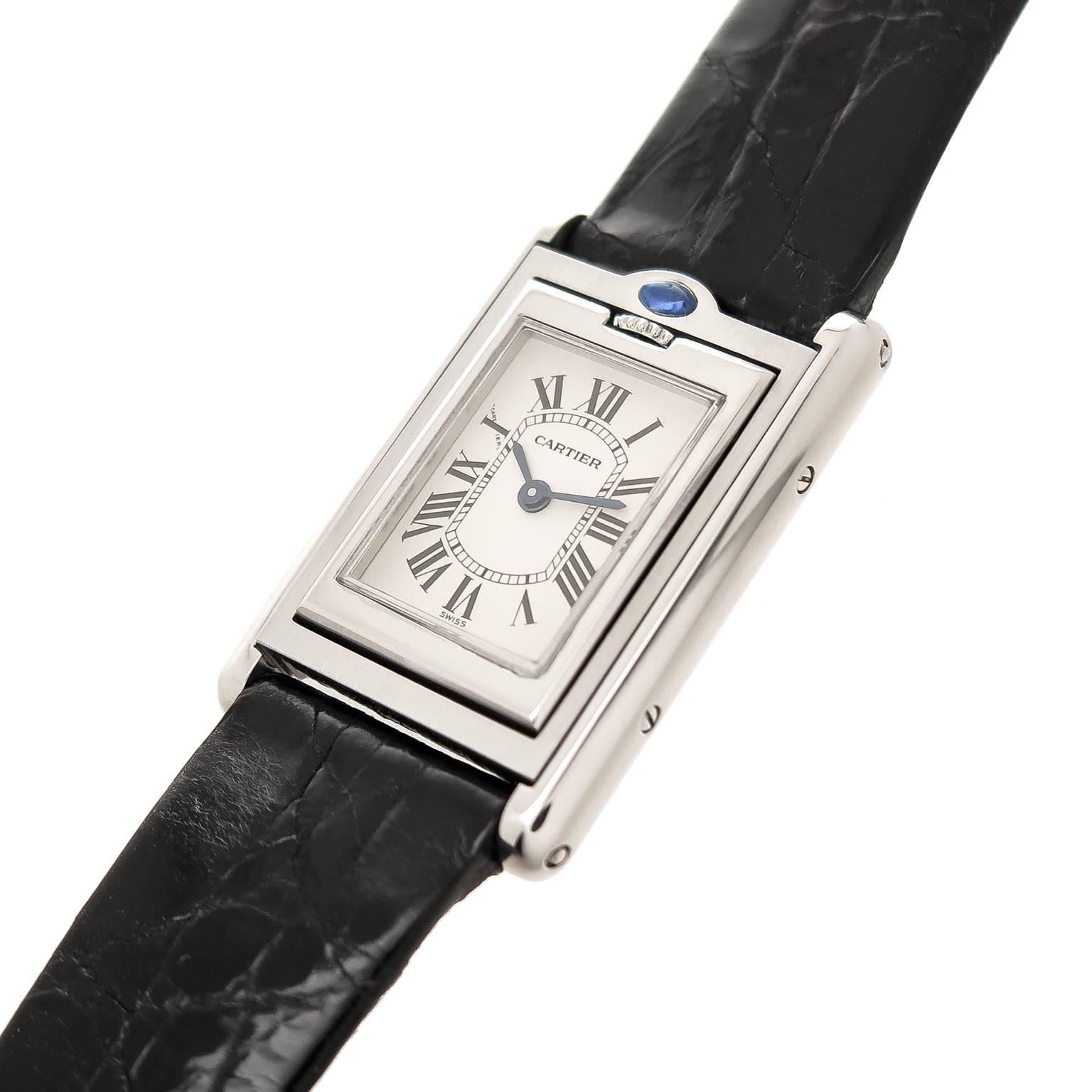 Circa 2010 Cartier, Basculante Reversible Wrist watch, 32 X 22 MM Water resistant Case, Quartz movement, White Dial with Black roman Numerals. New Black Croco Strap with original Cartier tang buckle. Total watch length 8 3/4 inches. Comes with