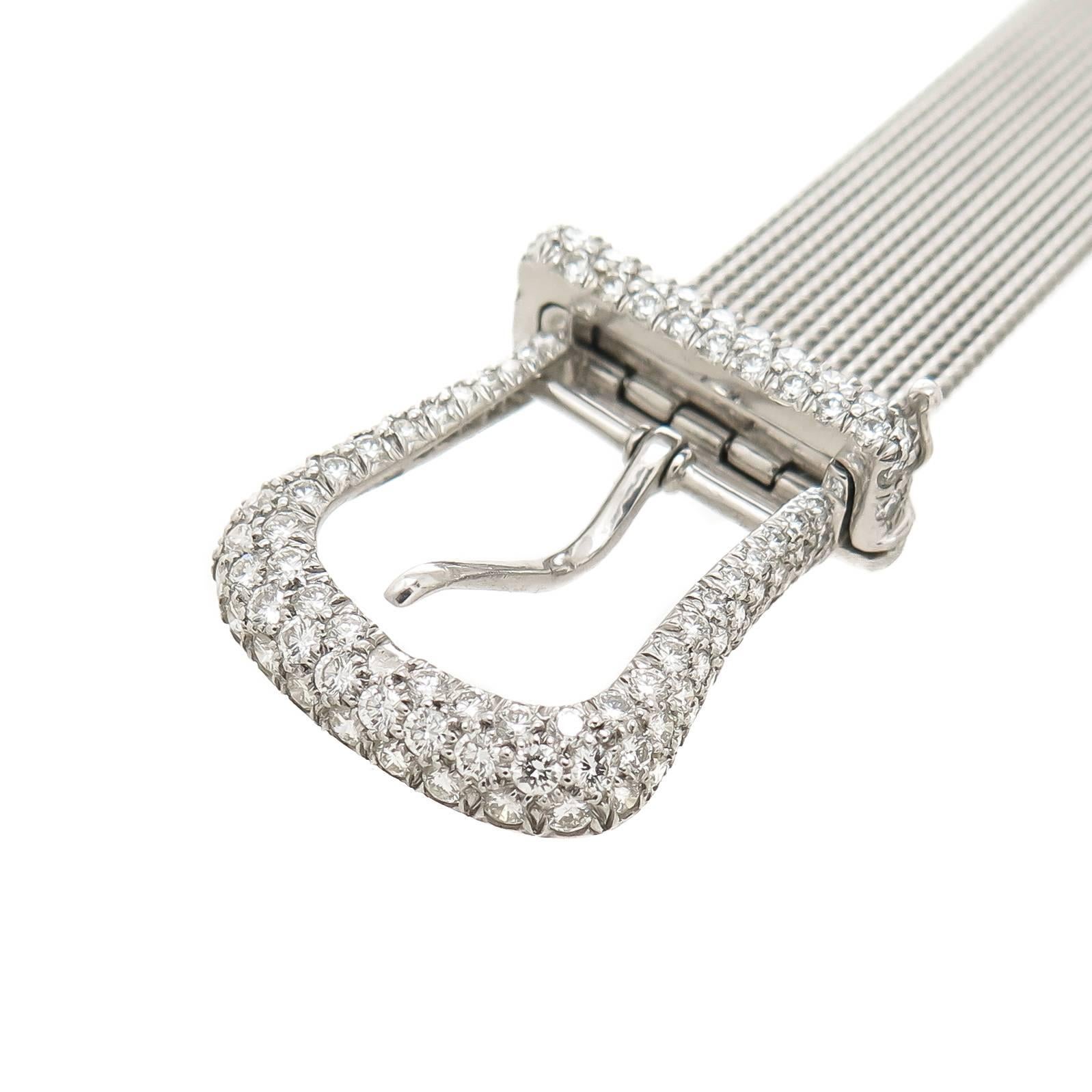 Circa 2000 Tiffany & Co. Platinum Mesh Buckle Bracelet, measuring 1/2 inch wide 1.75 MM thick and weighs 48 Grams. Set with 3 Carats of Fine White Round Brilliant cut Diamonds. Total Bracelet length 8 3/4 inch and is adjustable to fit most any size