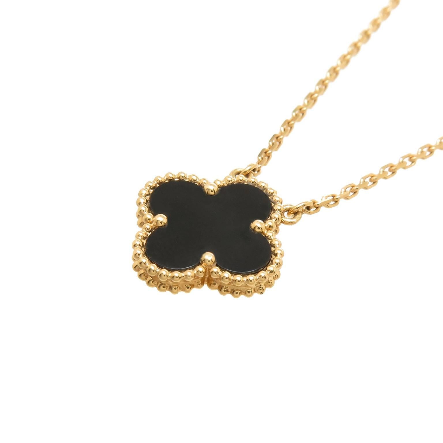 Circa 2010 Van Cleef and Arpels 18K Yellow Gold Vintage Collection Pendant Necklace set with Black Onyx. Total Length 17 inch and comes in VCA Suede Pouch.