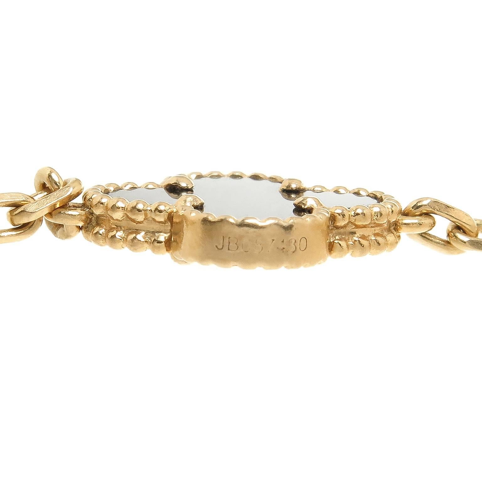 Circa 2012 Van Cleef and Arpels 18K yellow Gold 5 Station Onyx Alhambra vintage collection bracelet. measuring 7 1/2 inch in length. Comes in original VCA Suede Bracelet Pouch.