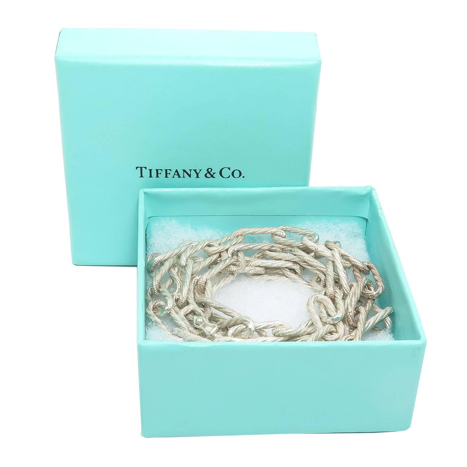 Circa 1980 Tiffany & Company Sterling Silver Chain, measuring 30 inches in length and having 1/4 inch wide textured finish links. Excellent unworn condition and comes in the original Tiffany Box.