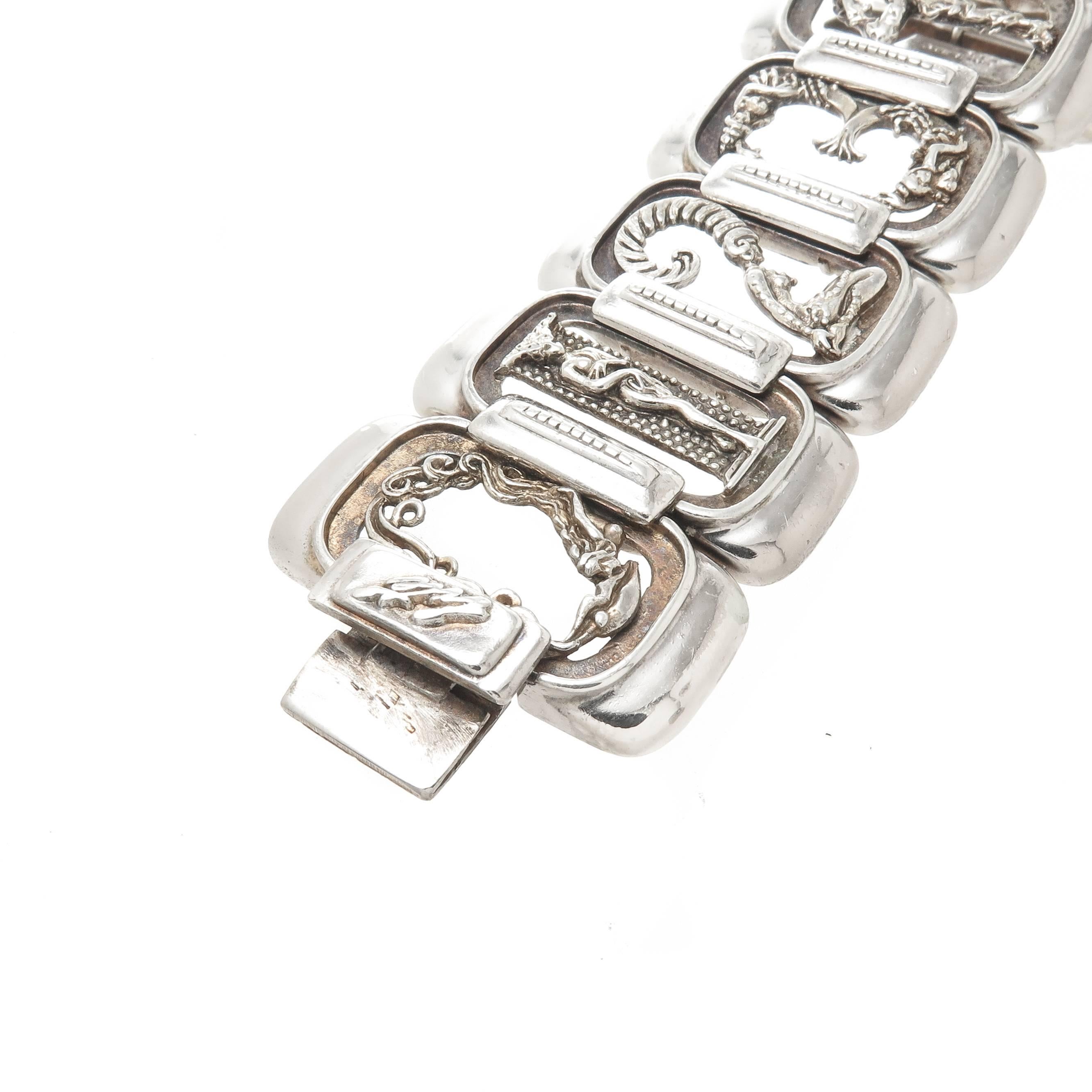 Circa 1980s Erte Sterling Silver Numbers Suite Bracelet, measuring 7 1/2 inch in length and 1 3/8 inch wide. Signed, Numbered and also have the stamp of CFA Circle Fine Art Galleries. 
