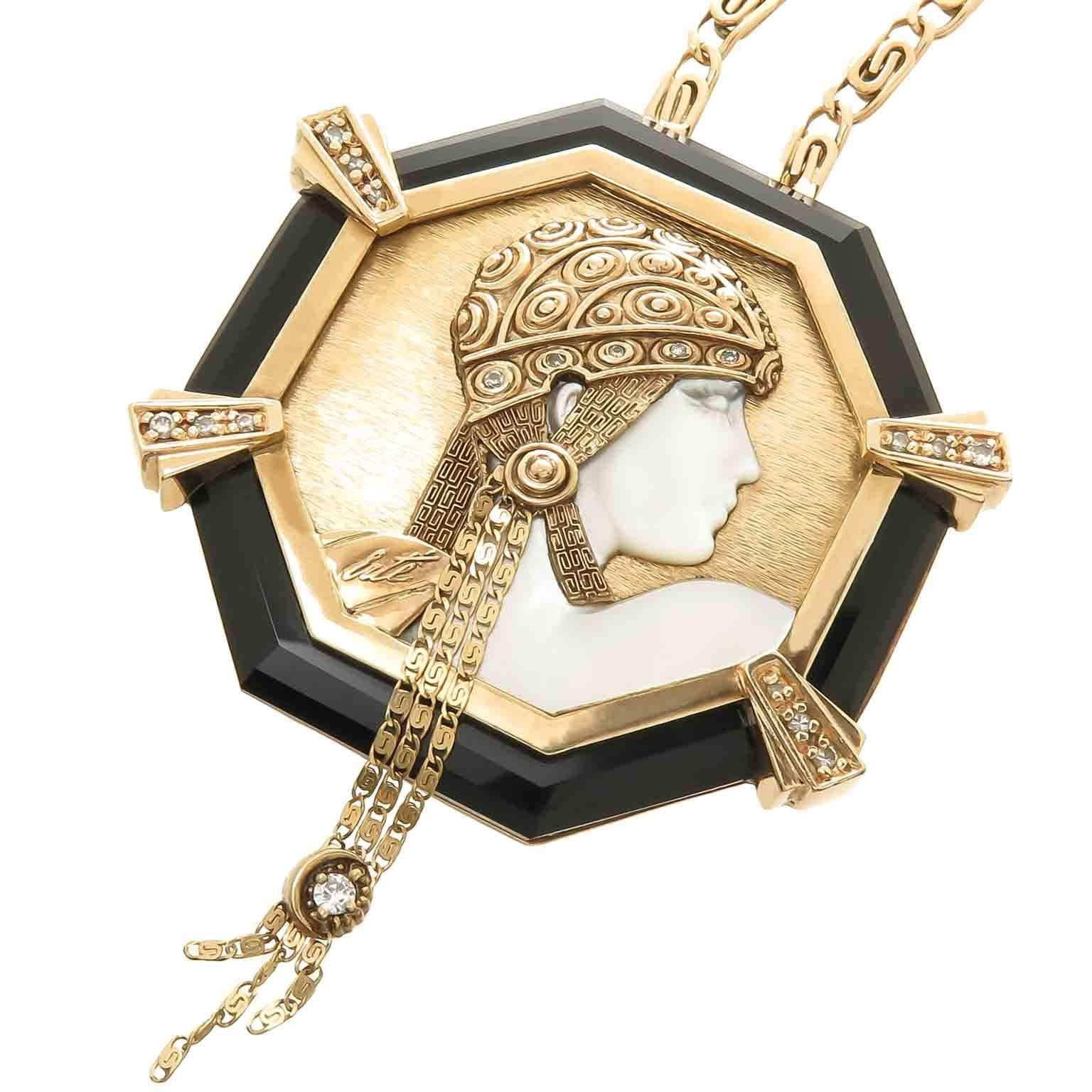 Circa 1979 Erte "Aventurine" Necklace in the Famous Erte Art deco style, the pendant portion measuring 2 inch in diameter and consists of a frame of Black Onyx and 14k Yellow Gold with a very detailed center featuring carved Mother of