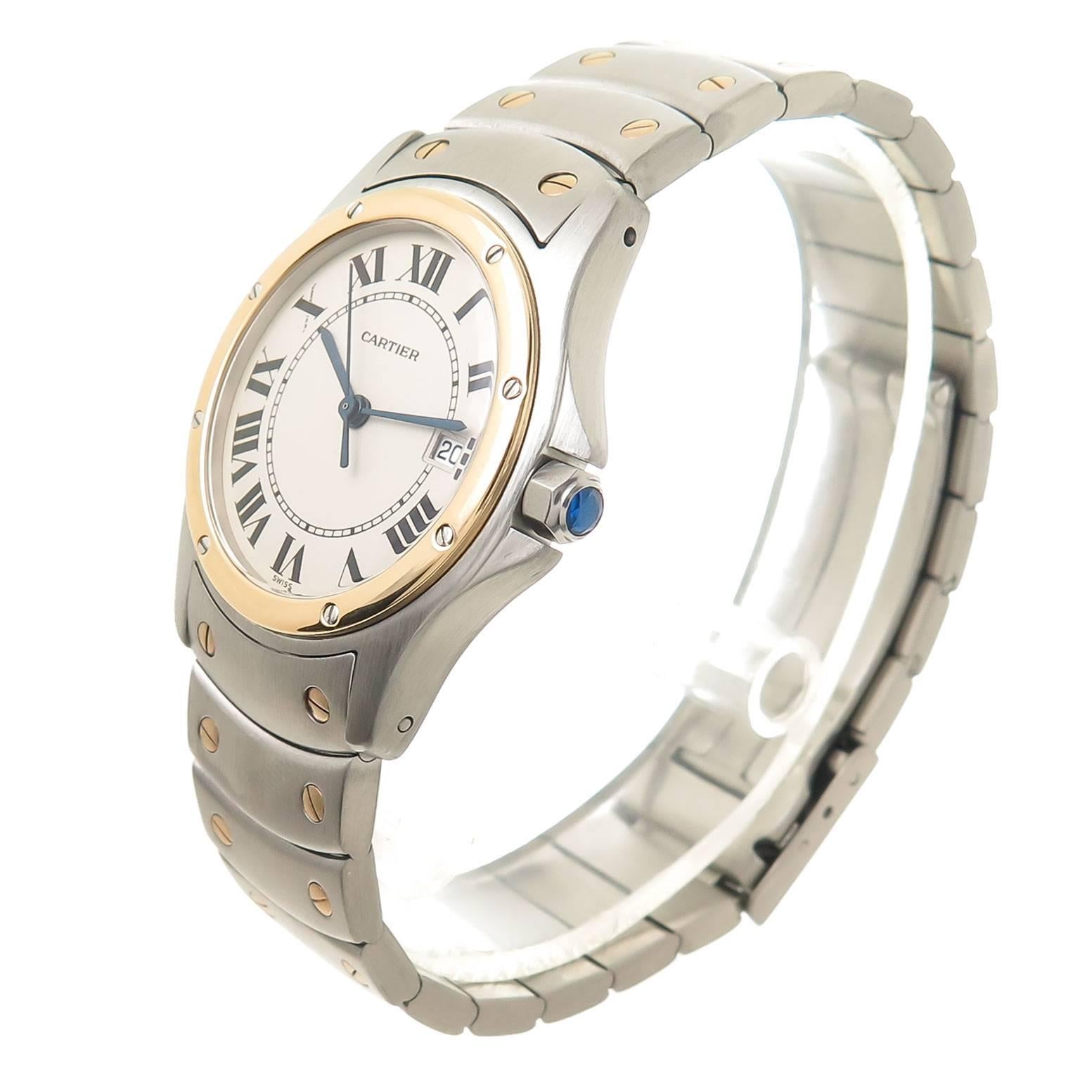 Circa 2005 Cartier Santos Ronde Wrist watch, 29.5 MM Stainless steel Water resistant Case with 18K yellow Gold Bezel. Quartz Movement, White Dial with Black Roman Numerals, sweep seconds hand, calendar window at the 3 position, scratch resistant