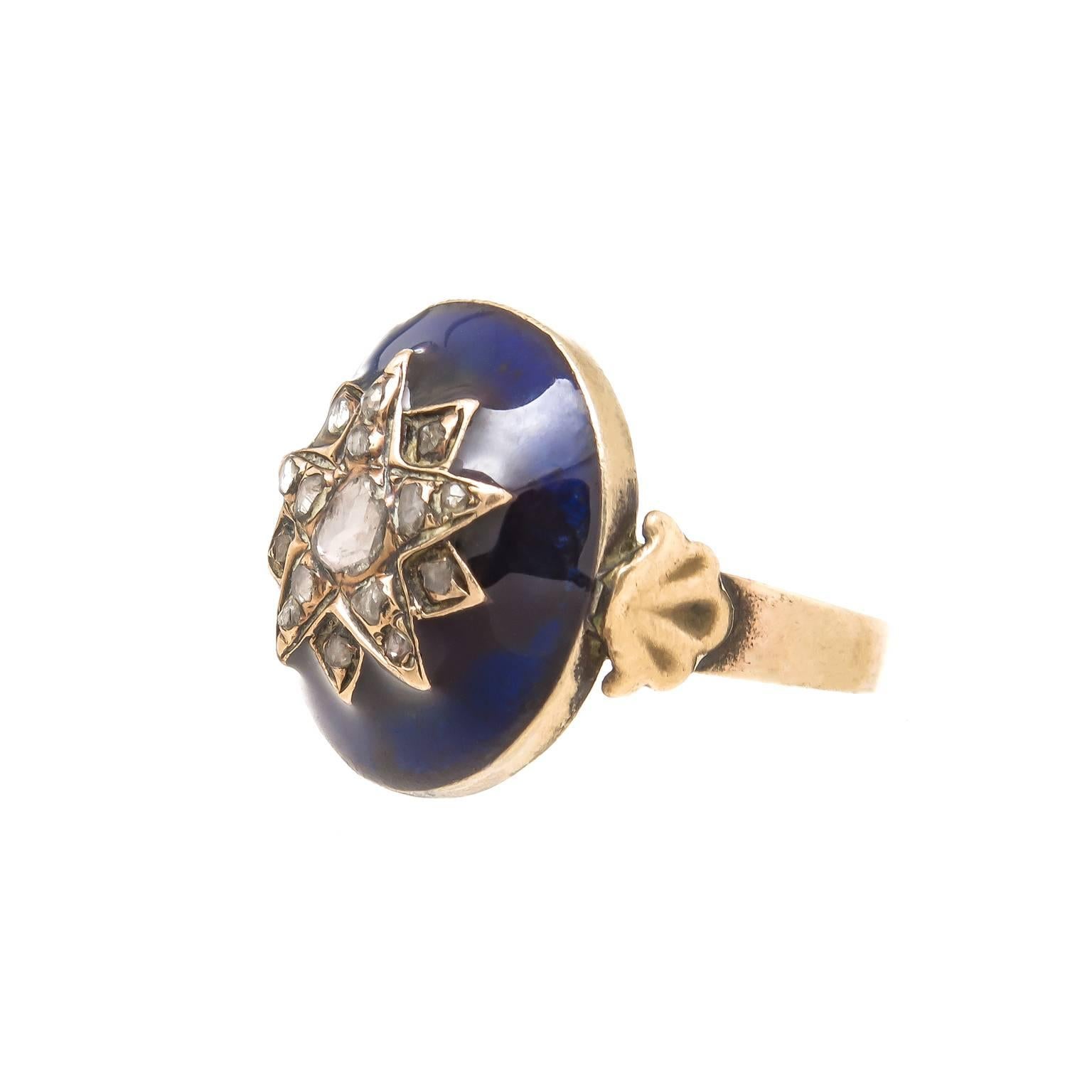 Circa 1820 - 1850 Yellow Gold ring, the top is finished in Cobalt Blue enamel with a center section set with Rose Cut Diamonds, the top measures 5/8 X 5/8 inch. Finger size = 7. 