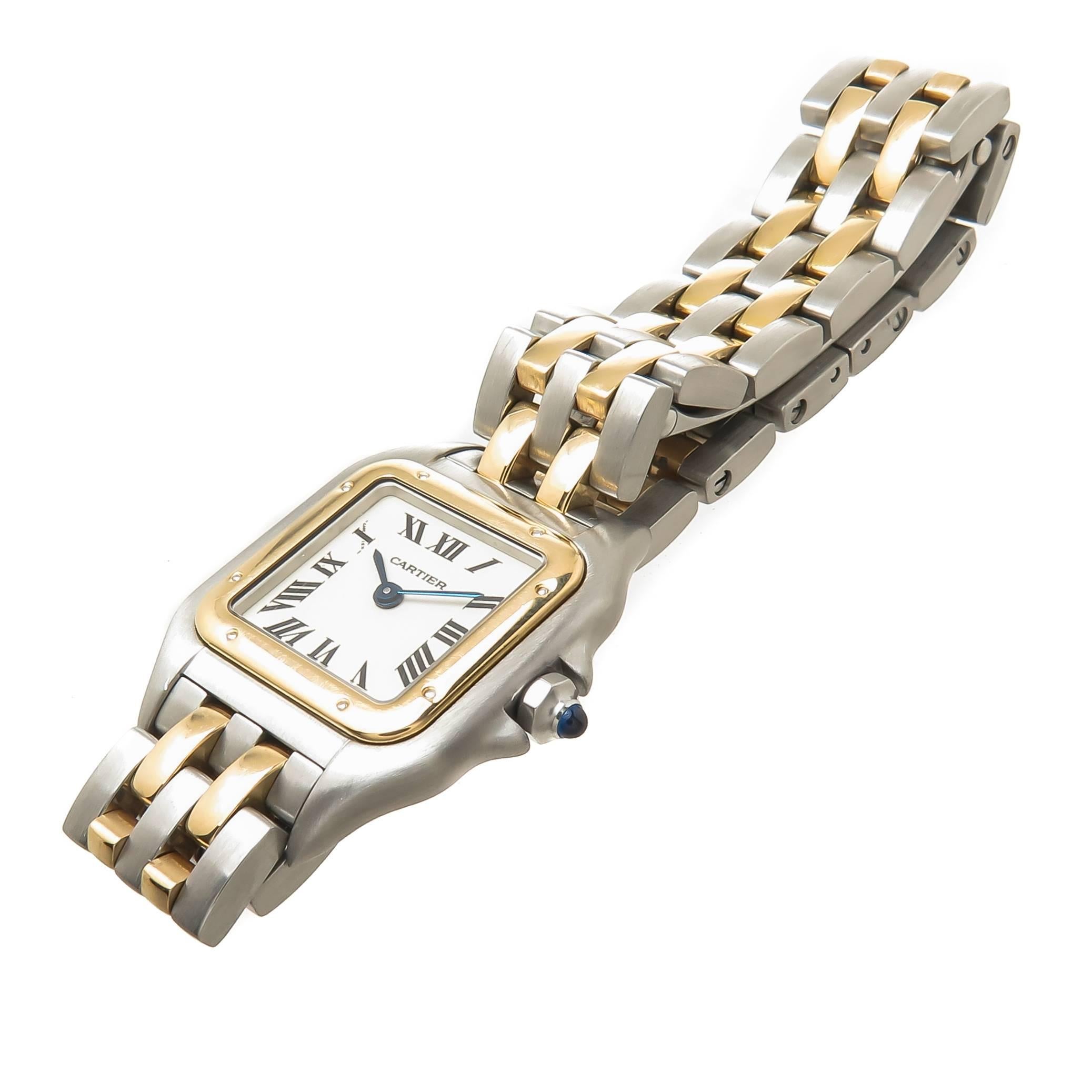 Circa 1990s Cartier Ladies Panther Collection Ladies Watch, 30 X 23 MM Stainless Steel Water resistant Case with 18K yellow Gold Bezel, Quartz Movement, White Dial with Black Roman Numerals and a sapphire Crown. 1/2 inch wide " 2 stripe "