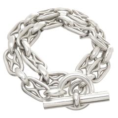 Hermès - Bracelet double enveloppe en maillons argentés avec fermoir mousqueton