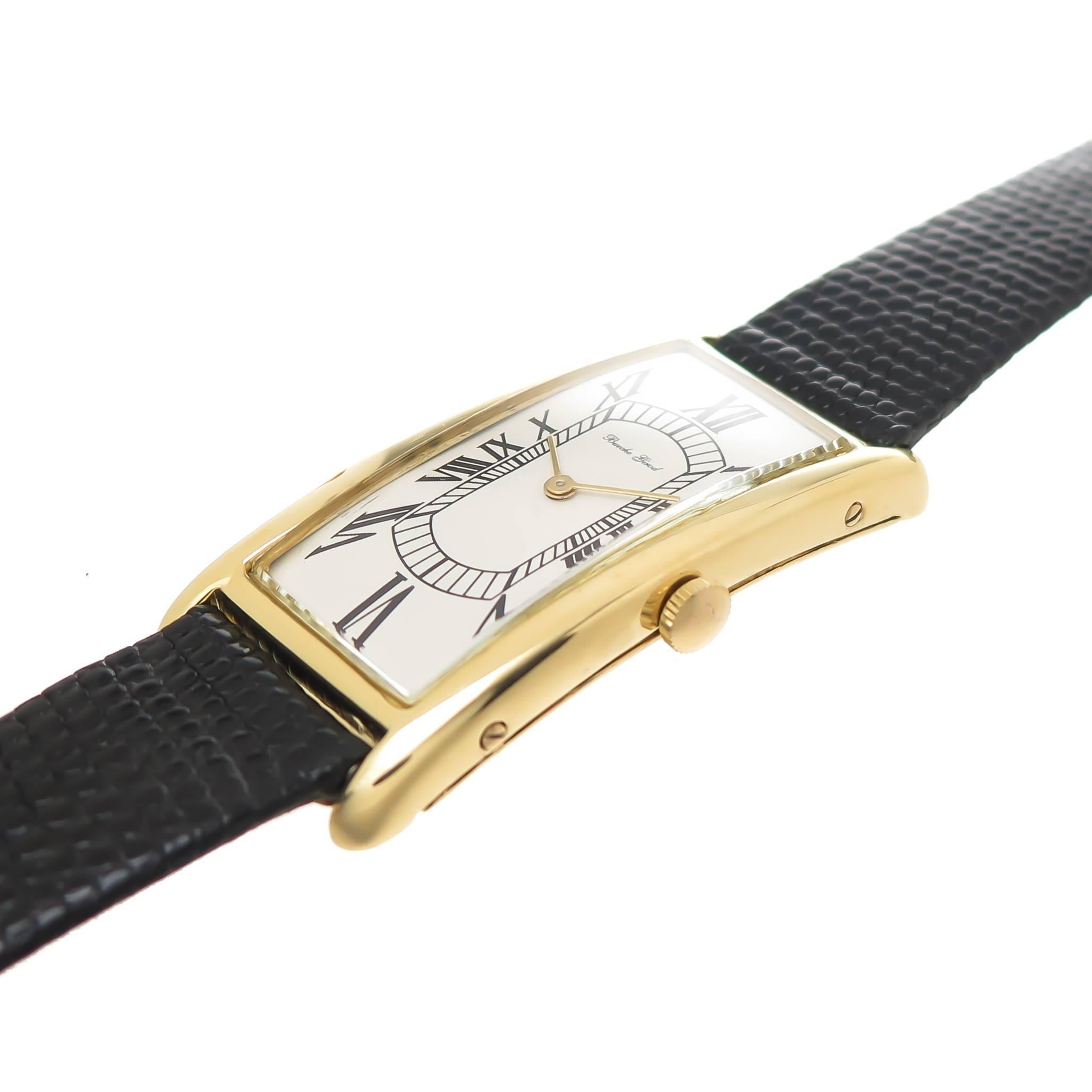 Circa 1970 Bueche Girod 18K yellow Gold Wrist Watch, measuring a dramatic 2 inches in Length ( 49 MM ) and 7/8 inch wide with a significant wrist fitting curve. 17 jewel mechanical, manual wind Movement, White dial with Black roman numerals. New