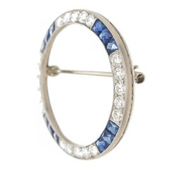 Oscar Heyman Platinum Diamond and Sapphire Circle Brooch