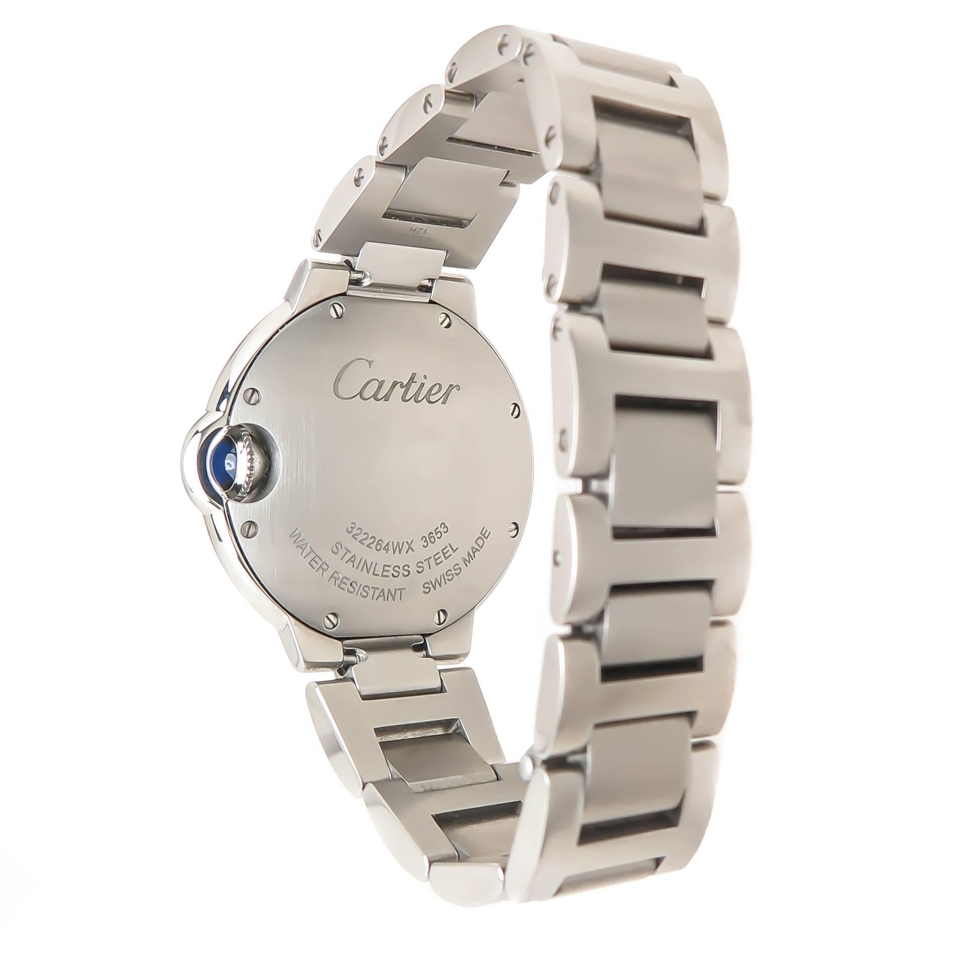 Circa 2016 Cartier Ballon Bleu Mid Size Wrist watch, 33 MM Stainless Steel water resistant case. Quartz Movement, Silvered, Engine turned Dial with Black Roman Numerals. 9/16 inch wide Bracelet with Deployment Buckle, fully linked and adjustable for