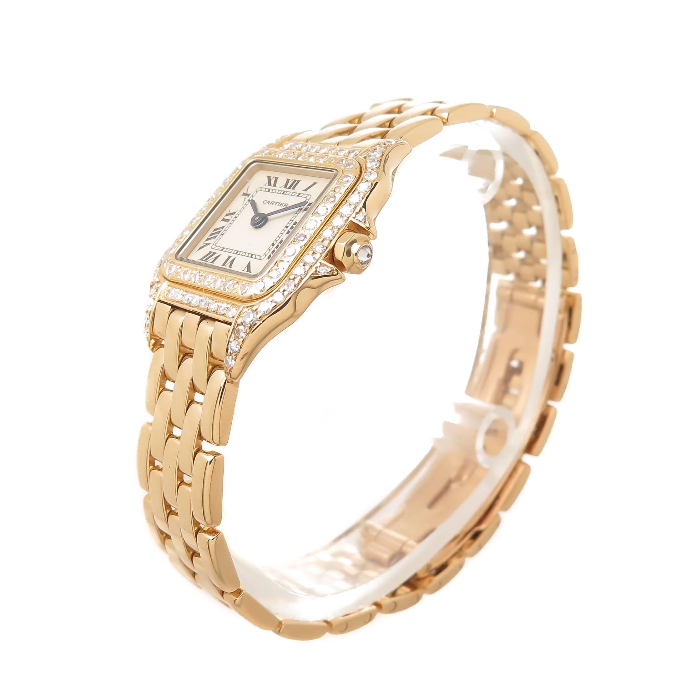Circa 1990s Cartier Panther collection Ladies Wrist watch 30 X 22 MM 18K yellow Gold Case. The Bezel, Case top and crown are all Cartier Factory set with Round Brilliant cut Diamonds totaling approximately 1.50 Carat. Quartz movement, White dial