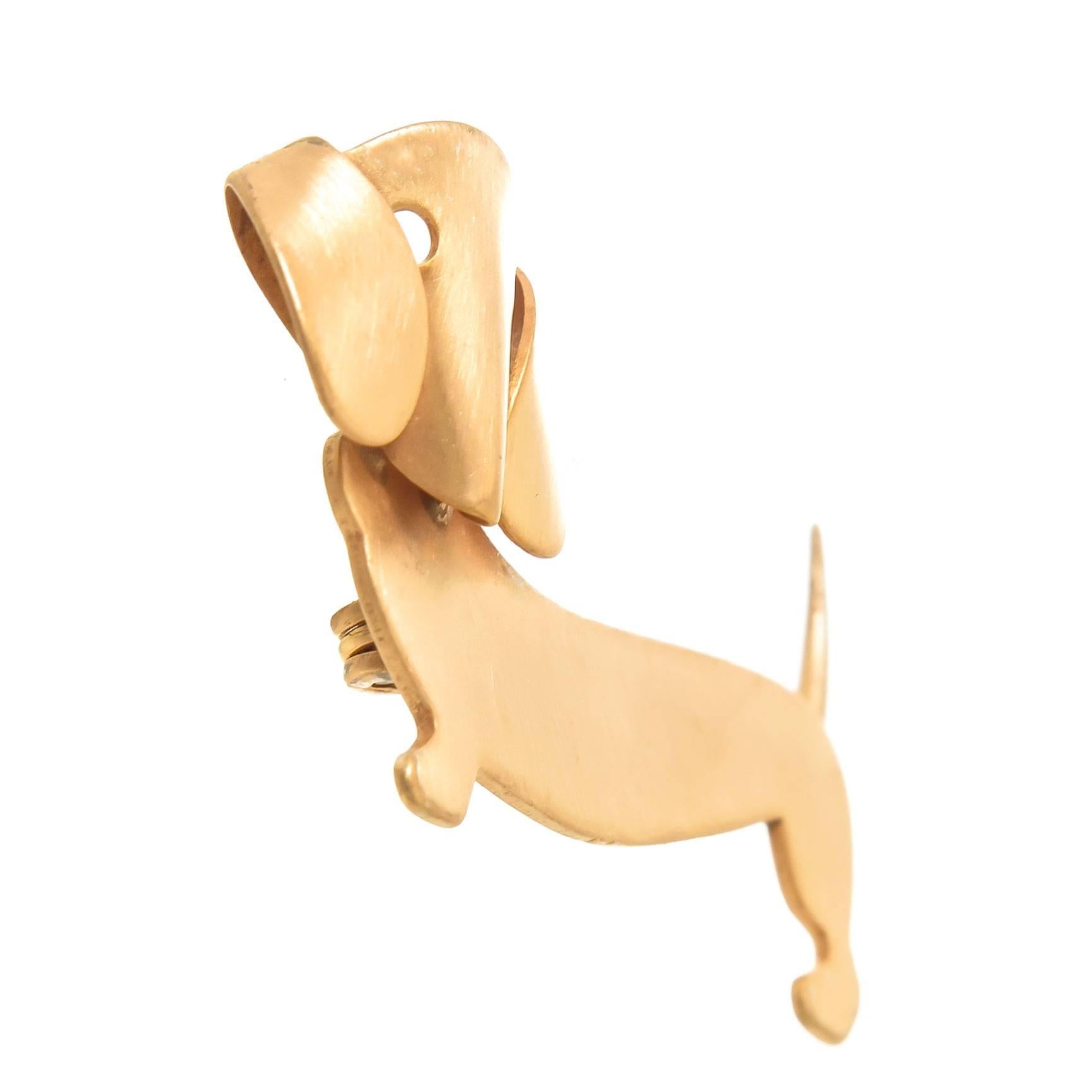 Circa 1960s Beau Gold Wash on Sterling Sterling Silver Dachshund Dog Brooch, measuring 2 inch in length x 1 inch. 