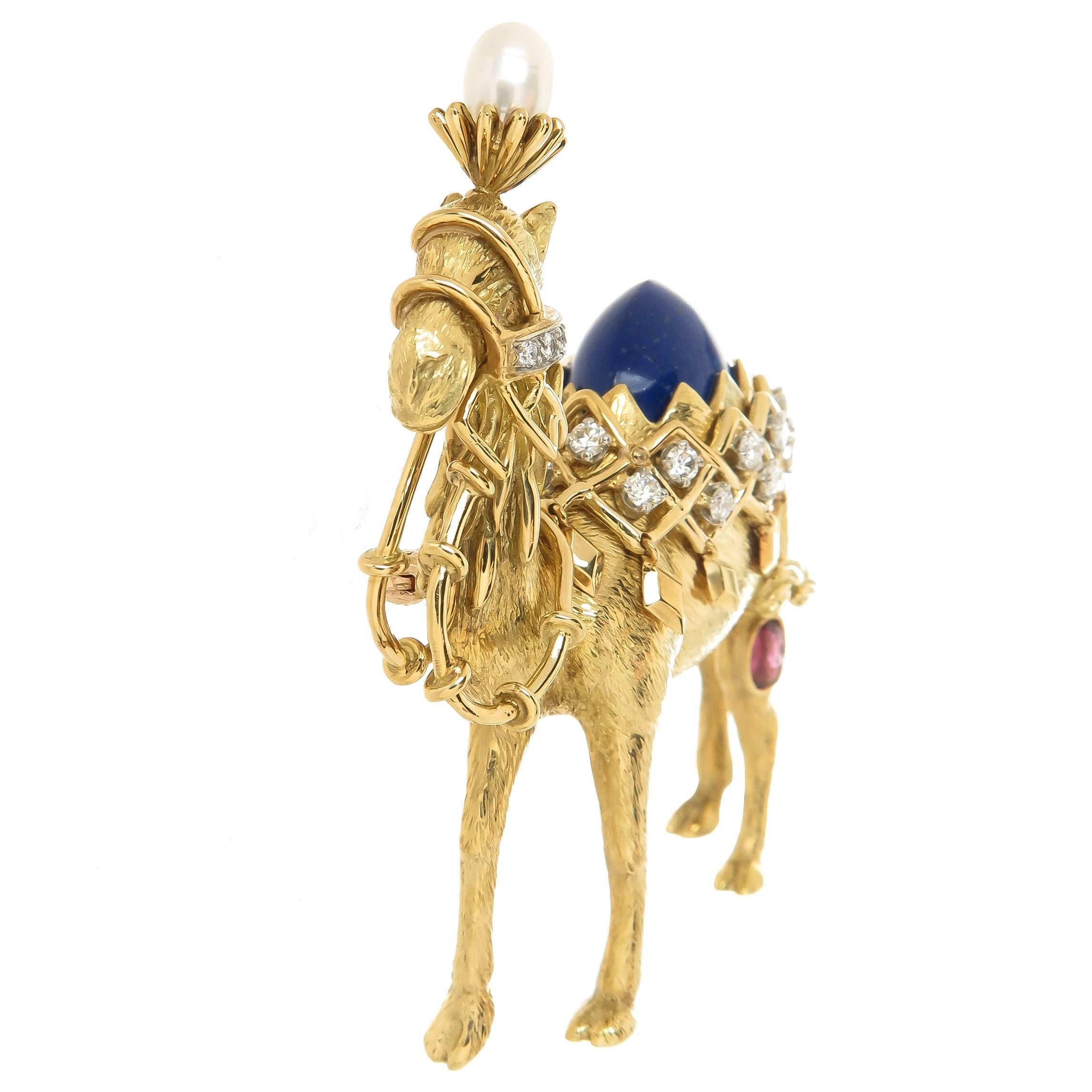 Circa 1980 Jean Schlumberger for Tiffany & Company Camel Brooch, one of the more scarce and Iconic pieces or whimsical sculpture jewelry by Schlumberger.  18K Yellow Gold and measuring 2 3/8 inch in height  X  2 1/4 inch in length  X  3/4 inch wide