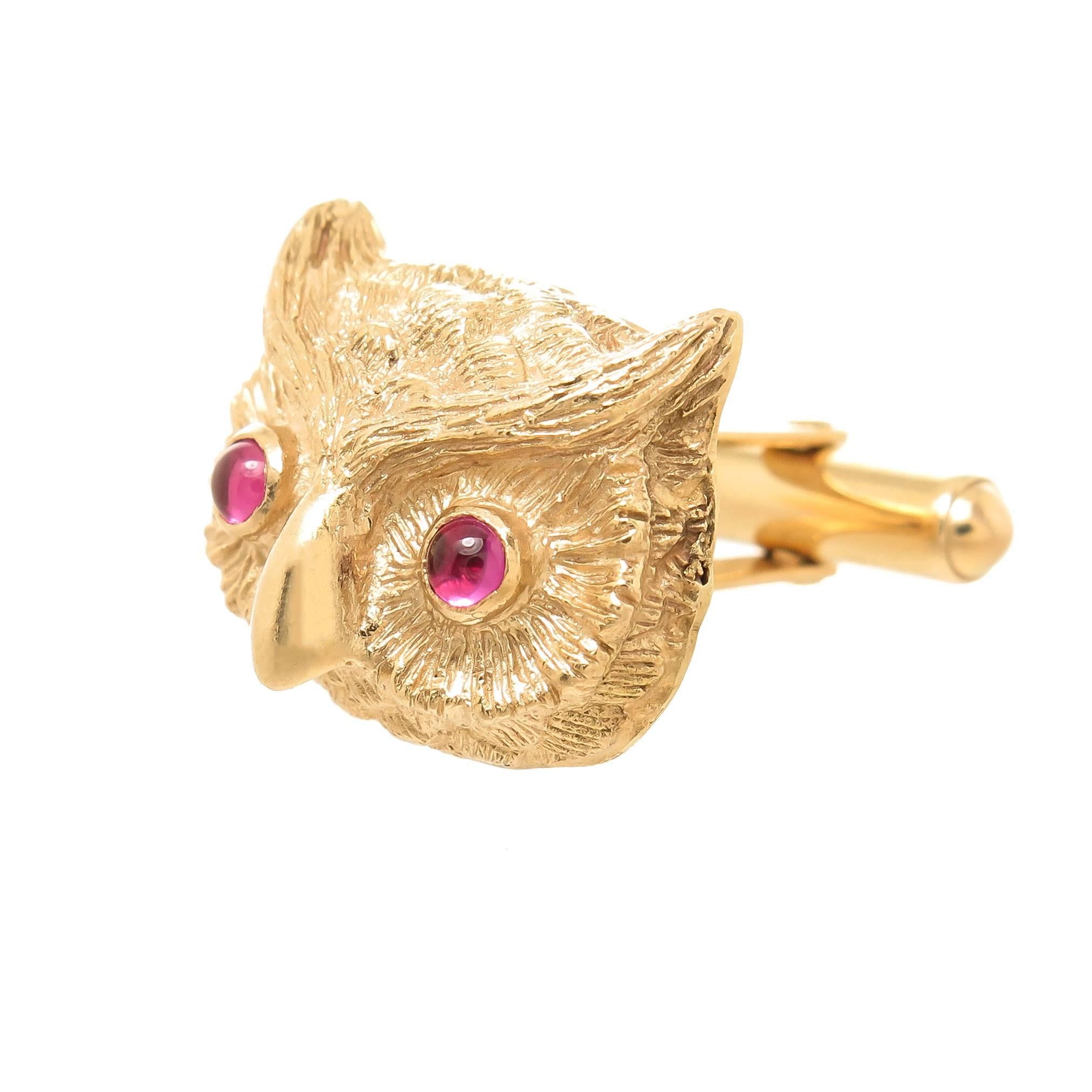 Circa 1970s 14K yellow Gold Owl head Cufflinks. The top measuring 3/4 X 5/8 inch and weighing 17 Grams. Nicely Detailed and having Cabochon Synthetic Ruby eyes. 