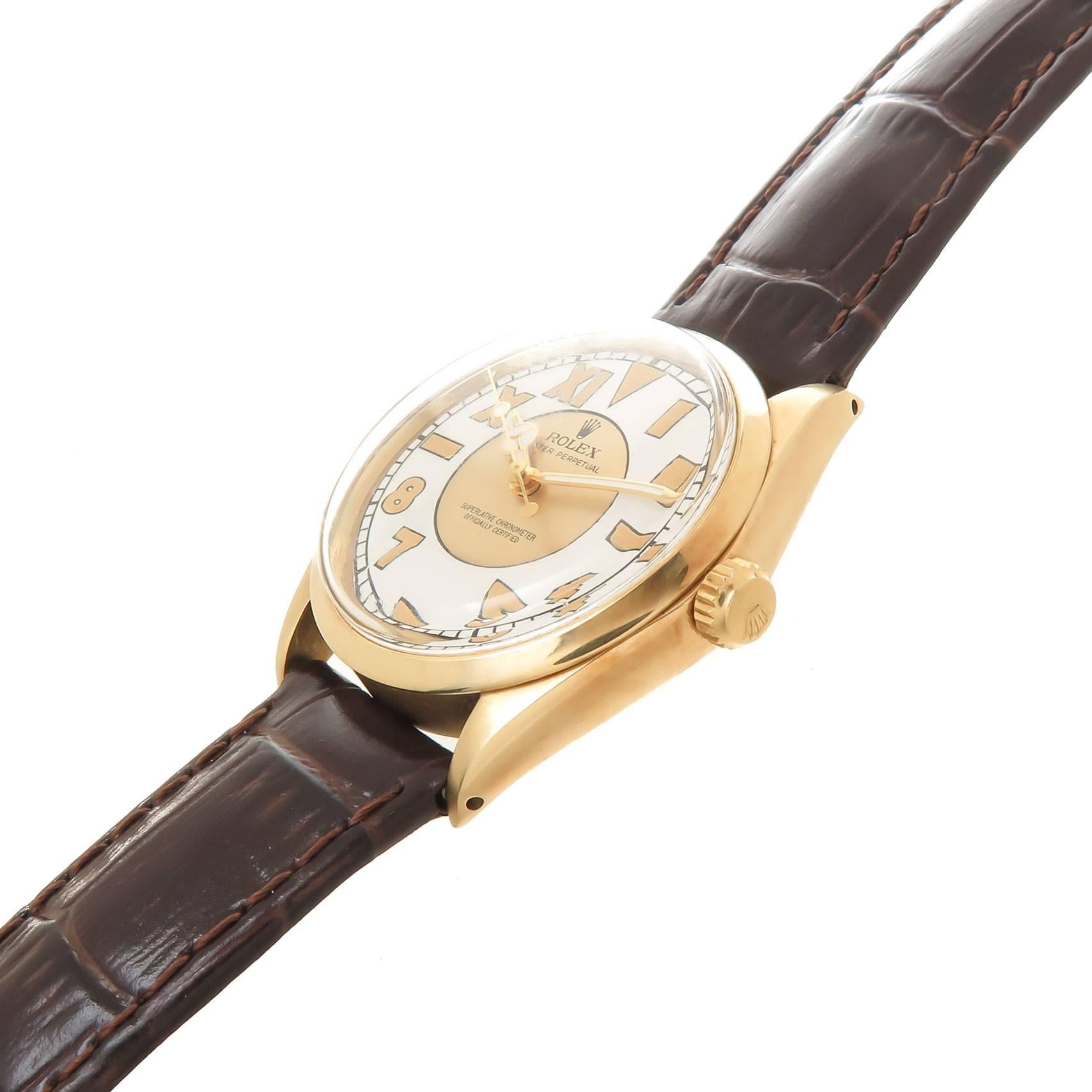 Circa 1948 Rolex Oyster perpetual Reference 1002 Wrist Watch 14K yellow Gold 34 MM 2 Piece Oyster case, Caliber 1570, 26 Jewel Automatic, self winding movement. Newly restored California style period dial with luminous markers, Mercedes hands and a