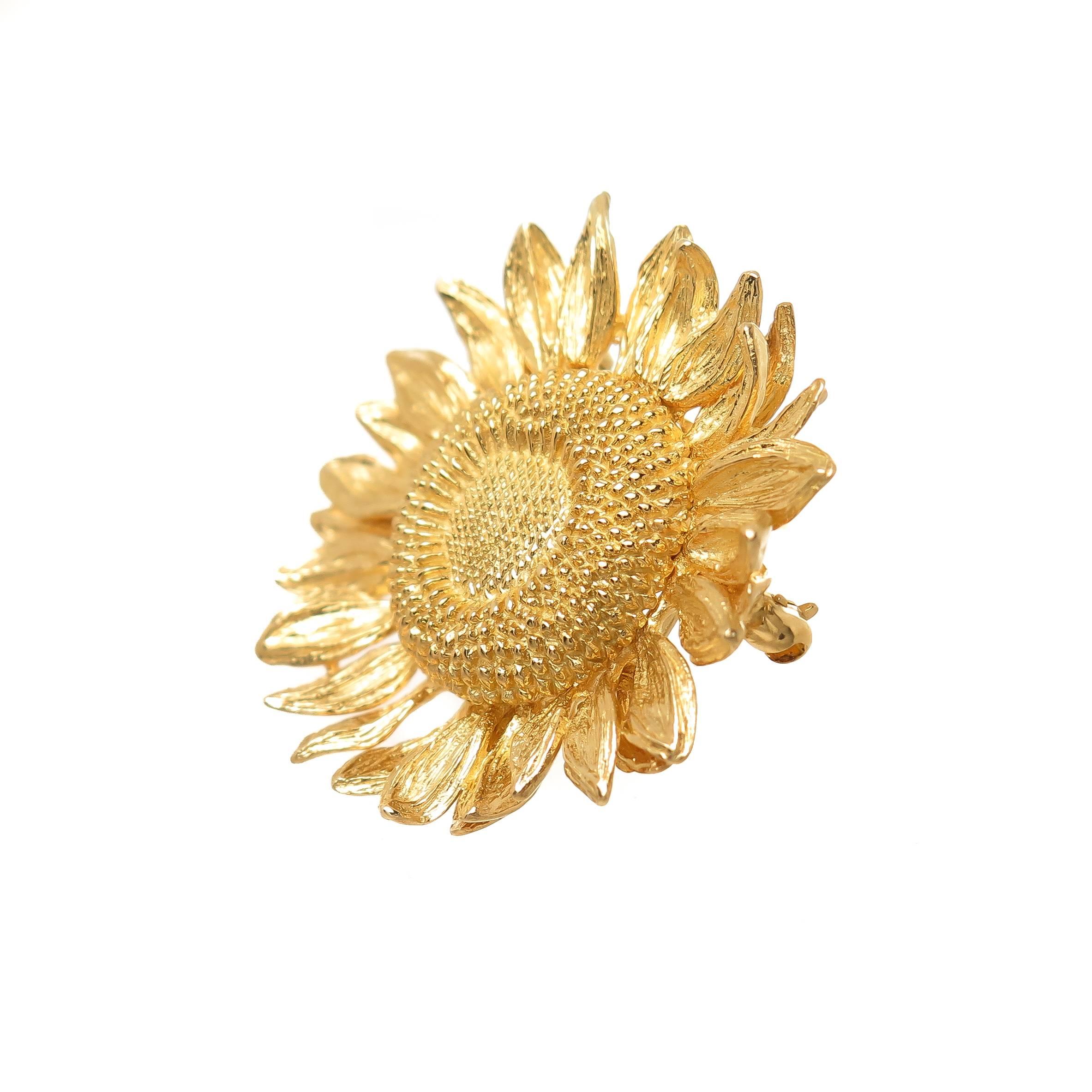Circa 2005 Asprey of London 18K yellow Gold Sunflower collection Brooch, measuring 1 3/8 inch in Diameter and weighing 18.2 Grams.  Very finely detailed and comes in the original Asprey Presentation Box. 