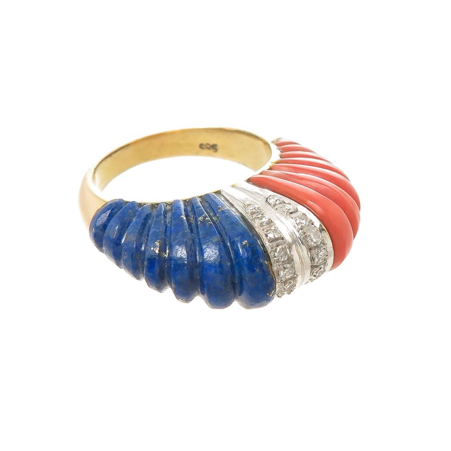 Circa 1960s 14K Yellow Gold Dome Ring, set with Diamonds and having Ribbed carved Coral and Lapis Lazuli. Measuring 1/4 inch wide and 1/2 inch high. Finger size = 7 1/4. 