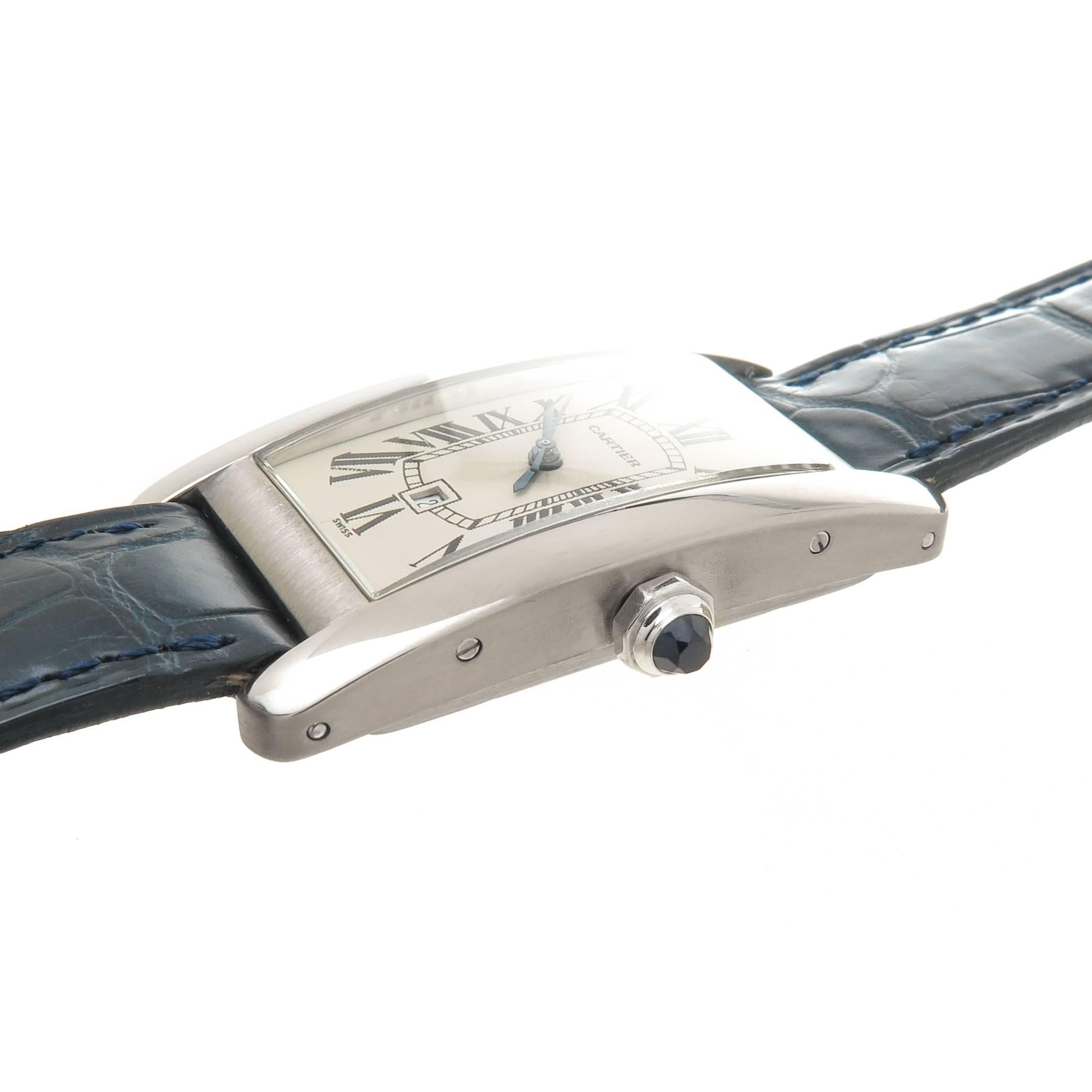 Circa 2000 Cartier Tank American Wrist Watch, 41 X 23 MM 18K White Gold water resistant case. Automatic, self Winding movement. Silver White Engine Turned Dial with Black Roman Numerals, sweep seconds hand, Calendar window at the 6 position and a