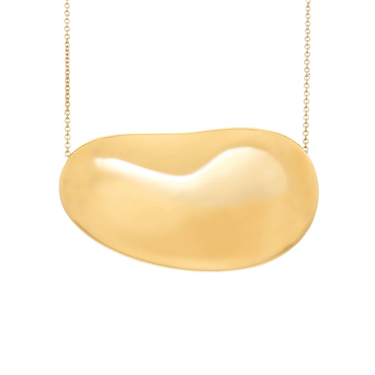 Tiffany and Co. Elsa Peretti Large Yellow Gold Bean Pendant Necklace at  1stDibs | chicago bean necklace, gold bean necklace