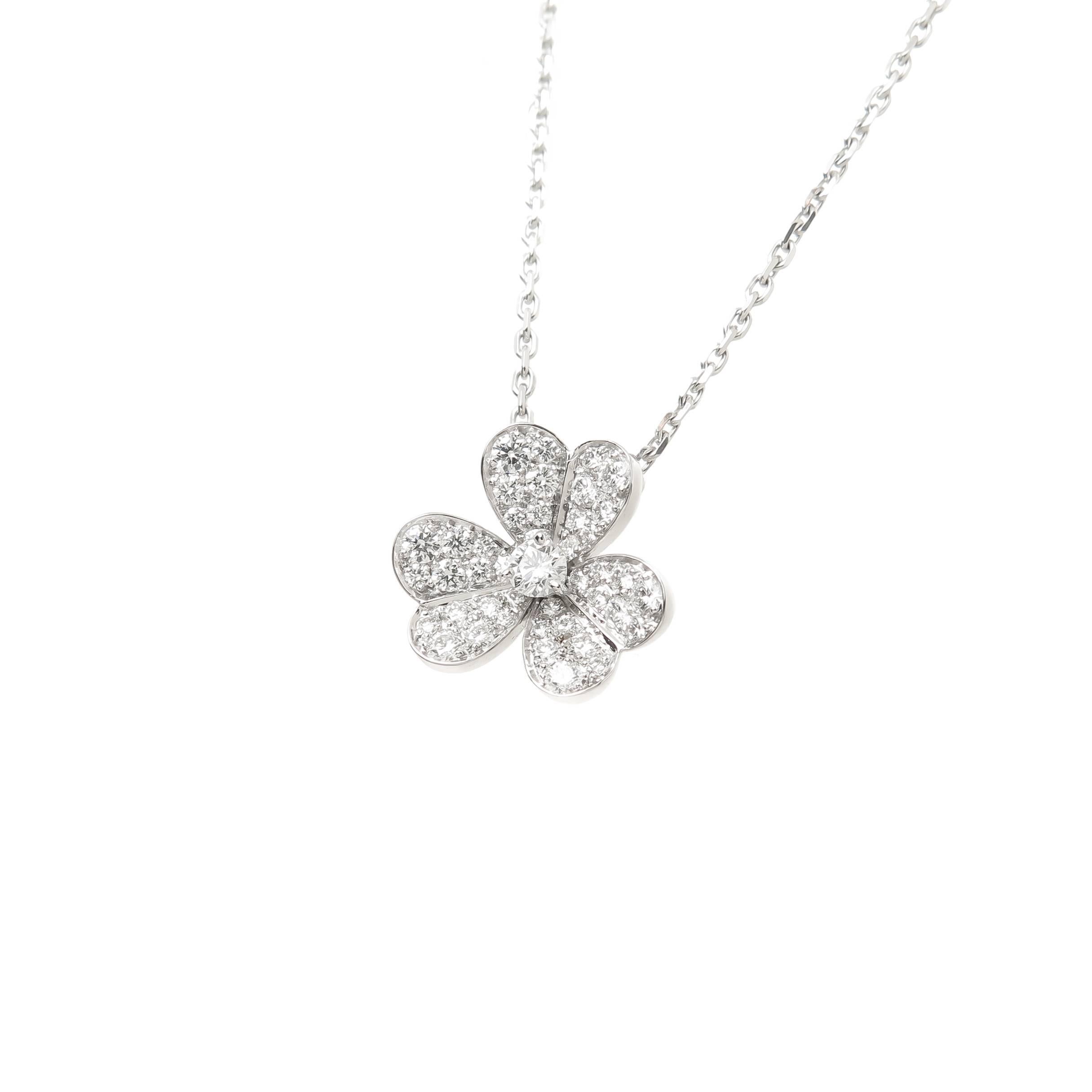 Circa 2009 Van Cleef and Arpels Frivole Collection 18k White Gold Flower Pendant. Measuring 15 X 15 MM and suspended from a 16 inch chain. Set with round Brilliant cut Diamonds totaling .80 Carat, grading as F in color and VVS in Clarity.  Excellent