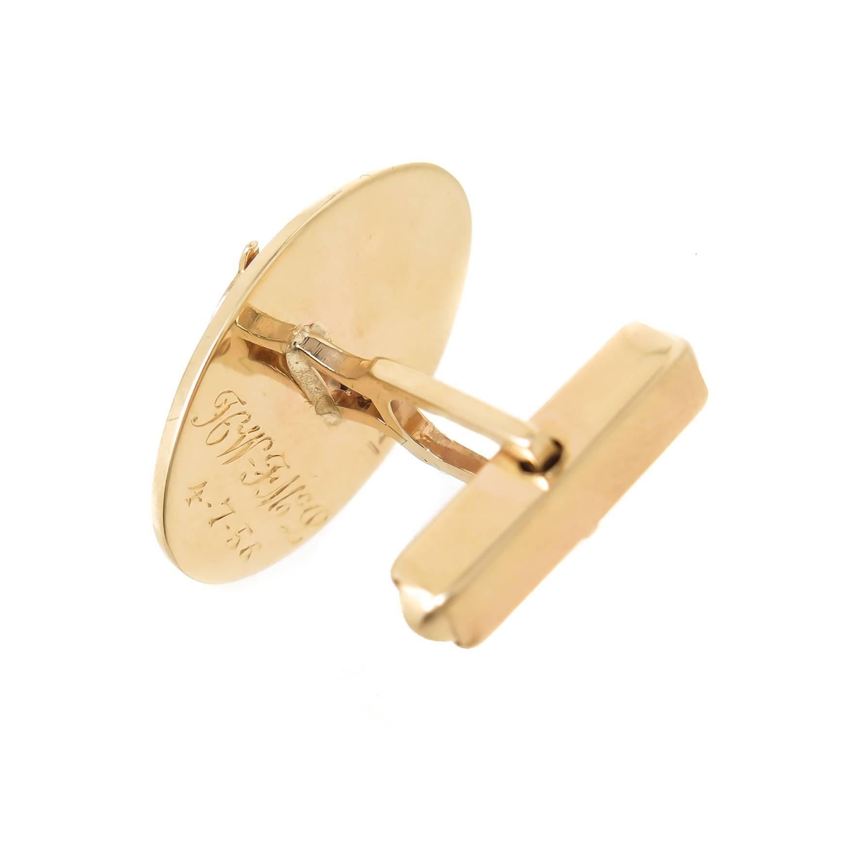Circa 1950s Very Cool 14K yellow Gold Telephone Cuff-links, with a detailed and movable Phone Dial that reads: 