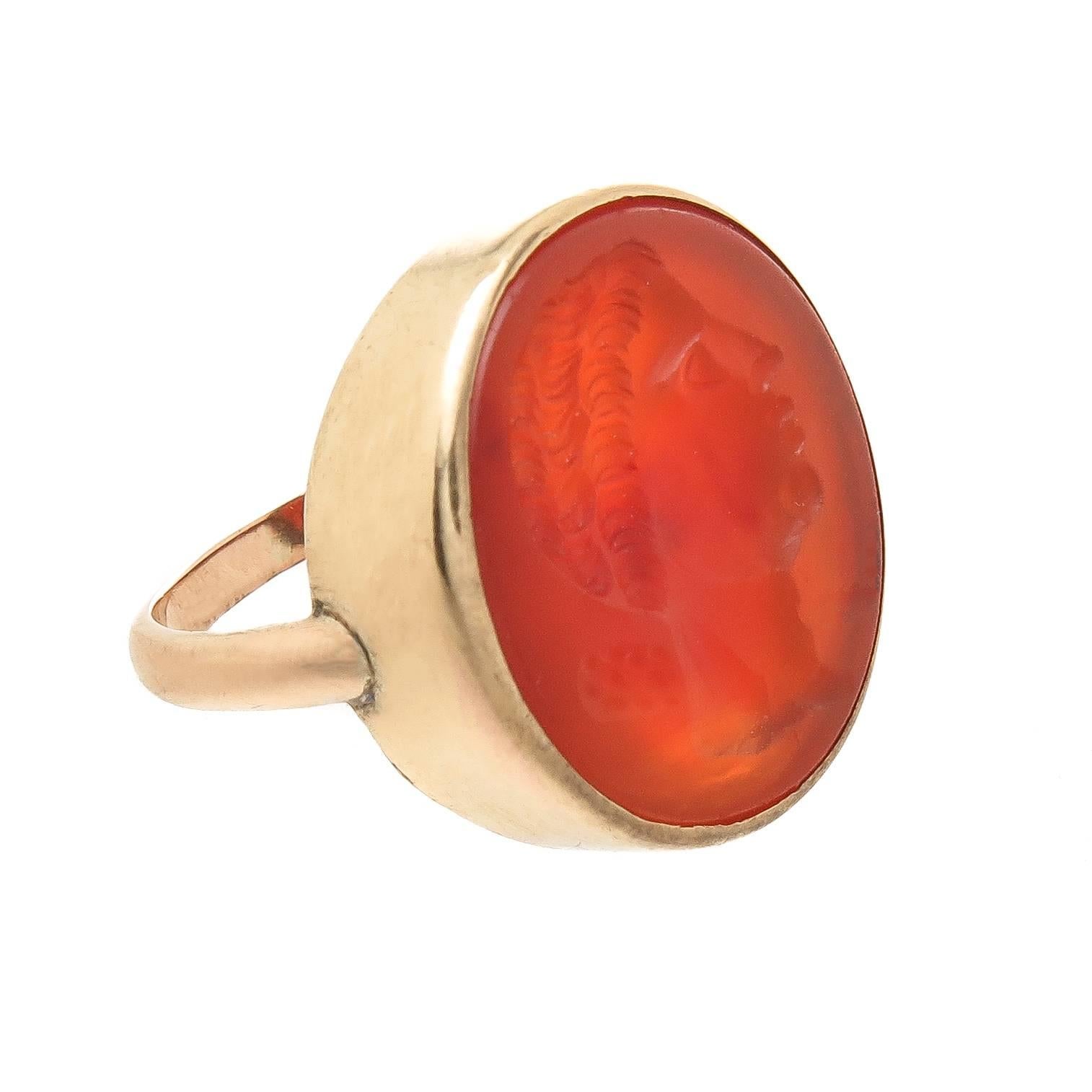 Circa 1850s 14k Yellow Gold Carved Carnelian Intaglio ring, featuring a portrait of an Ancient Roman Nobleman, the ring top measures 21 X 18 MM and the finger size is a 6 1/2. This ring comes in an original box from a Jeweler in Edinburgh Scotland.