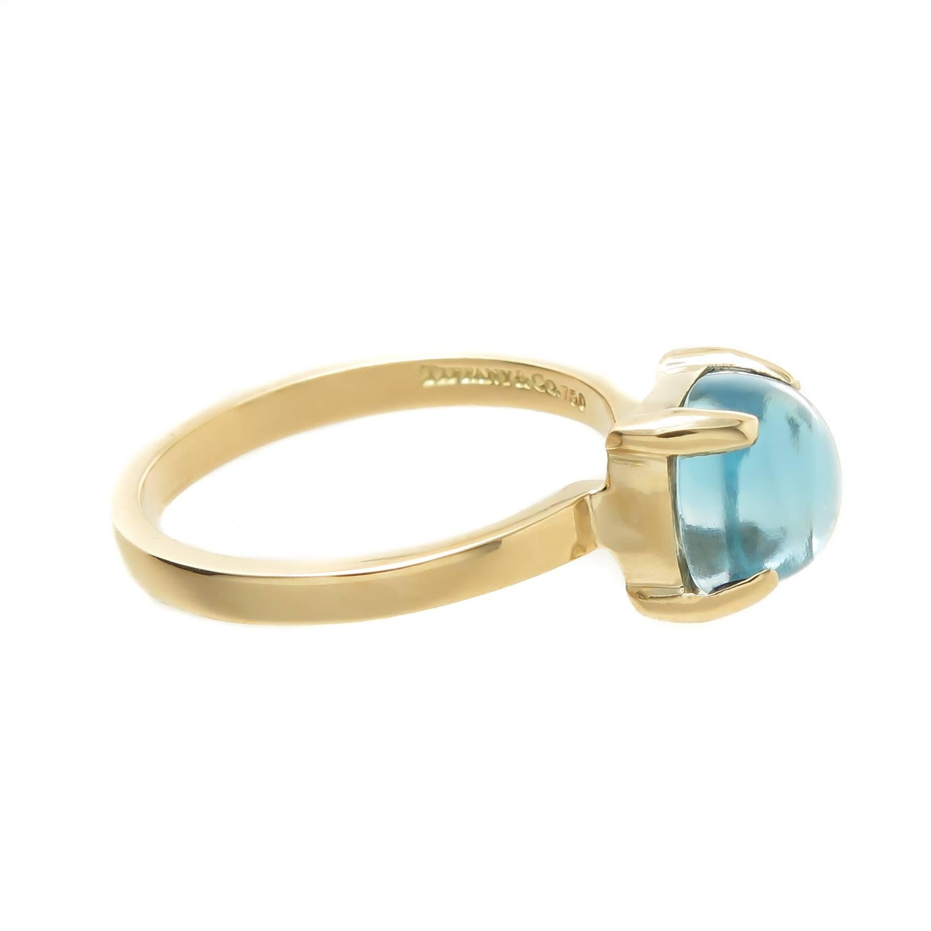 Circa 2015 Paloma Picasso for Tiffany & Company Sugar Stacks Collection 18K Yellow Gold Ring, set with a Fine Blue Sugar loaf Cut Topaz. Finger Size 6. Comes in Tiffany Suede pouch. 