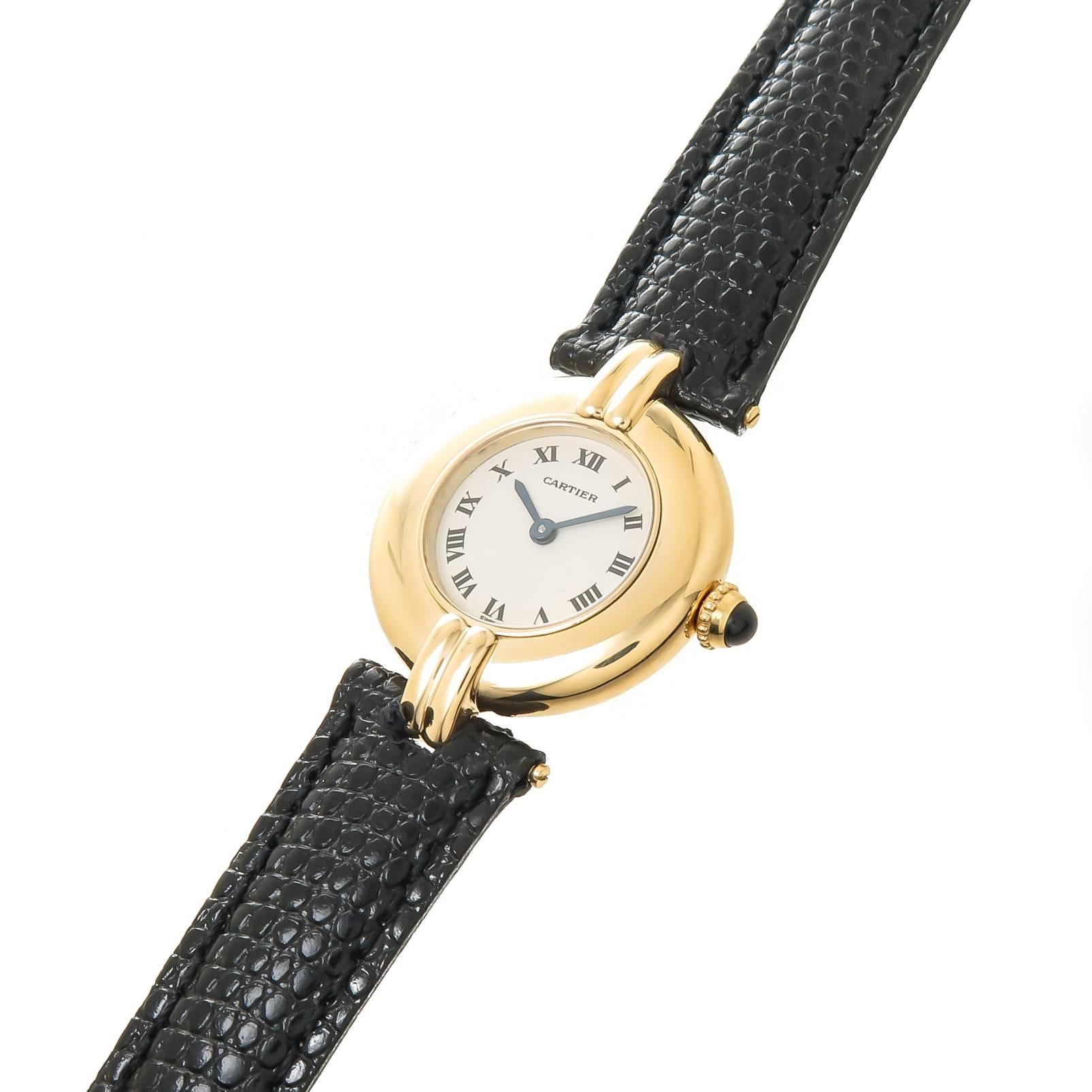 Circa 2000 Cartier Colisee Ladies Wrist Watch, 24 MM 18K Yellow Gold Case, Quartz movement, white Dial with Black Roman Numerals, Sapphire Crown. New Hadley Roma Black Lizard Grain Leather Strap with original Cartier Gold Plate Tang Buckle. Watch