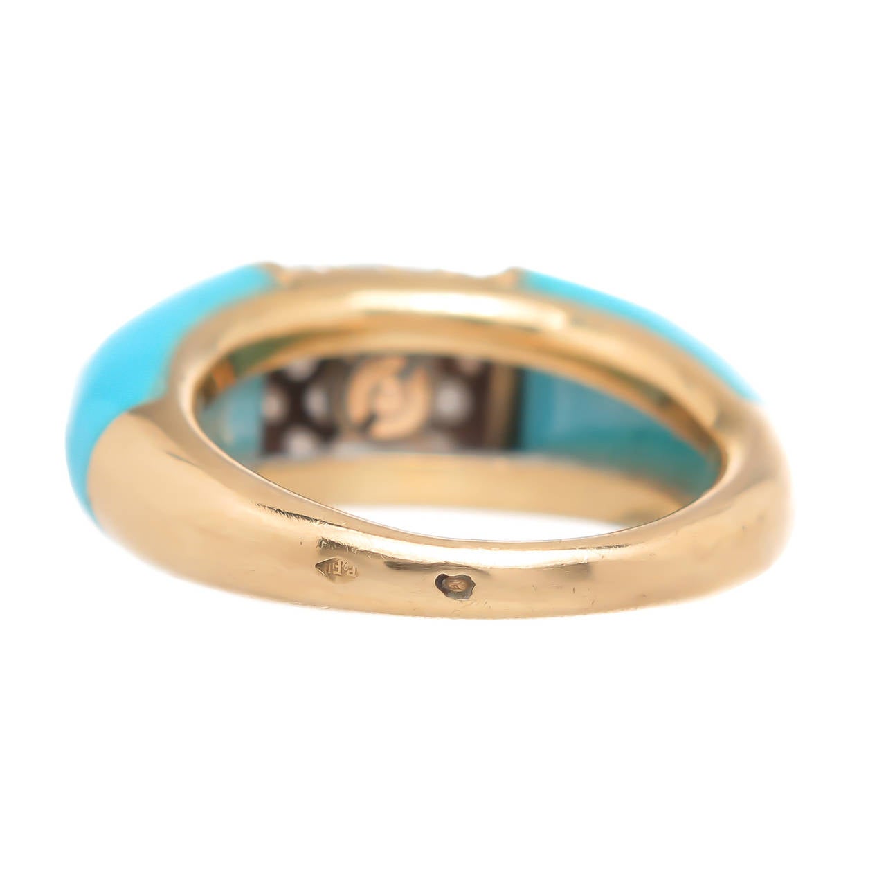 Van Cleef & Arpels Philippine Ring, 18K Yellow Gold and Persian Turquoise. Centrally set with 27 Fine White Diamonds totaling 1 Carat. Signed, Numbered and Having French Hall Marks. Finger Size = 6 1/2