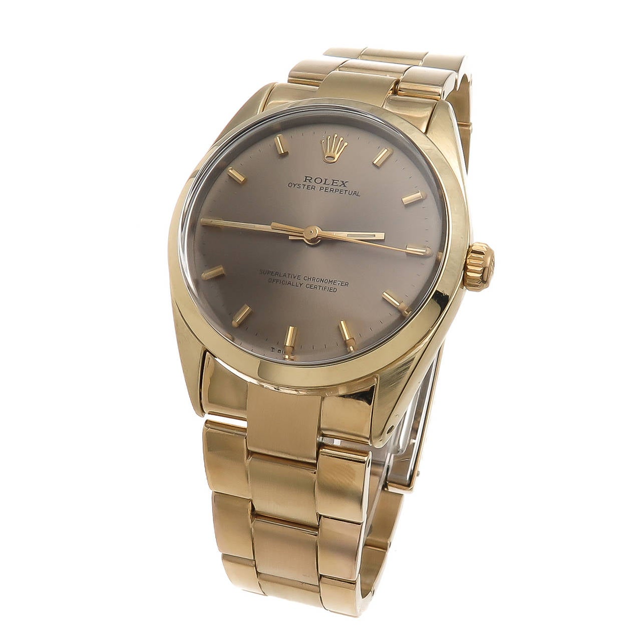Rolex 1966 Gold Shell, steel back reference 1024 33 MM Case on a heavy Gold Shell Oyster Bracelet, very rare color Gray Dial with raised markers, Caliber 1570 26 jewel Automatic, self winding movement. An excellent condition, clean one owner watch