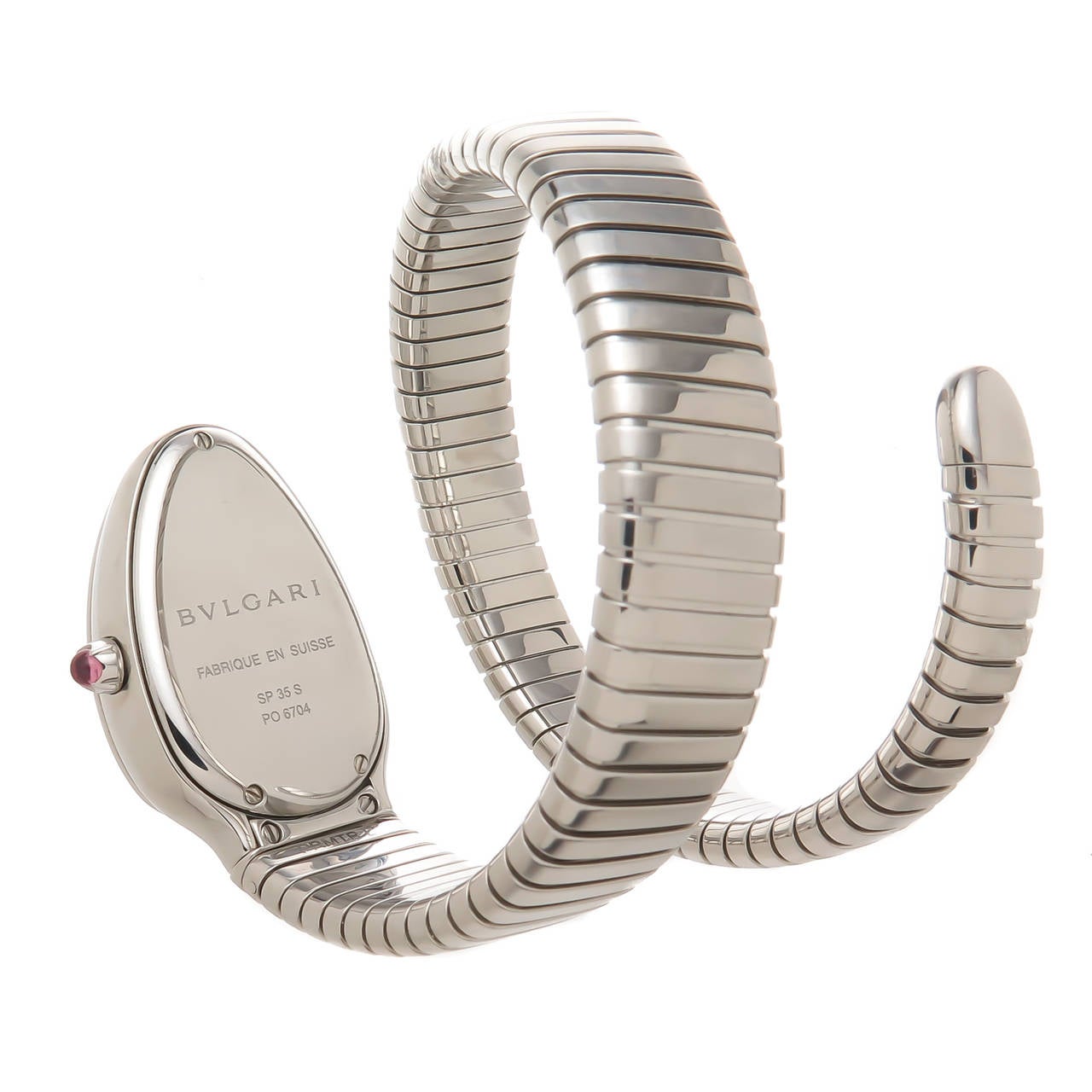 Circa 2013 Bulgari Serpenti Spiga Wrist Watch in Stainless Steel, flexible coiled steel snake bracelet, will adjust to fit most any wrist. 35 MM head, White textured dial with raised markers, Quartz movement, Rubelite Cabochon Crown. Original