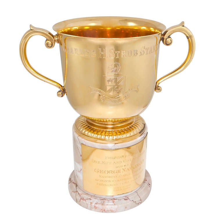 Circa: 1970s Heavy Gold wash on Sterling Silver Trophy by Tiffany & Company on a Marble base with Gold wash Sterling Plaque also by Tiffany.  This beautiful trophy has a very heavy Gold Wash that Makes this hand engraved piece look like solid Gold,