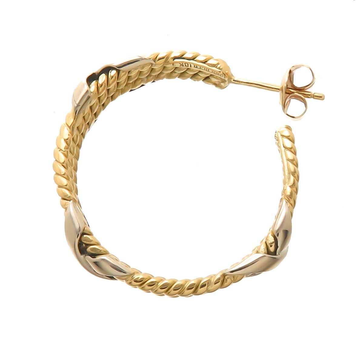 Circa 1990 Jean Schlumberger for Tiffany & Company 18k Yellow Gold 3 Row Rope and X Hoop Earrings. Measuring 3/16 inch wide and 1 inch in Diameter.