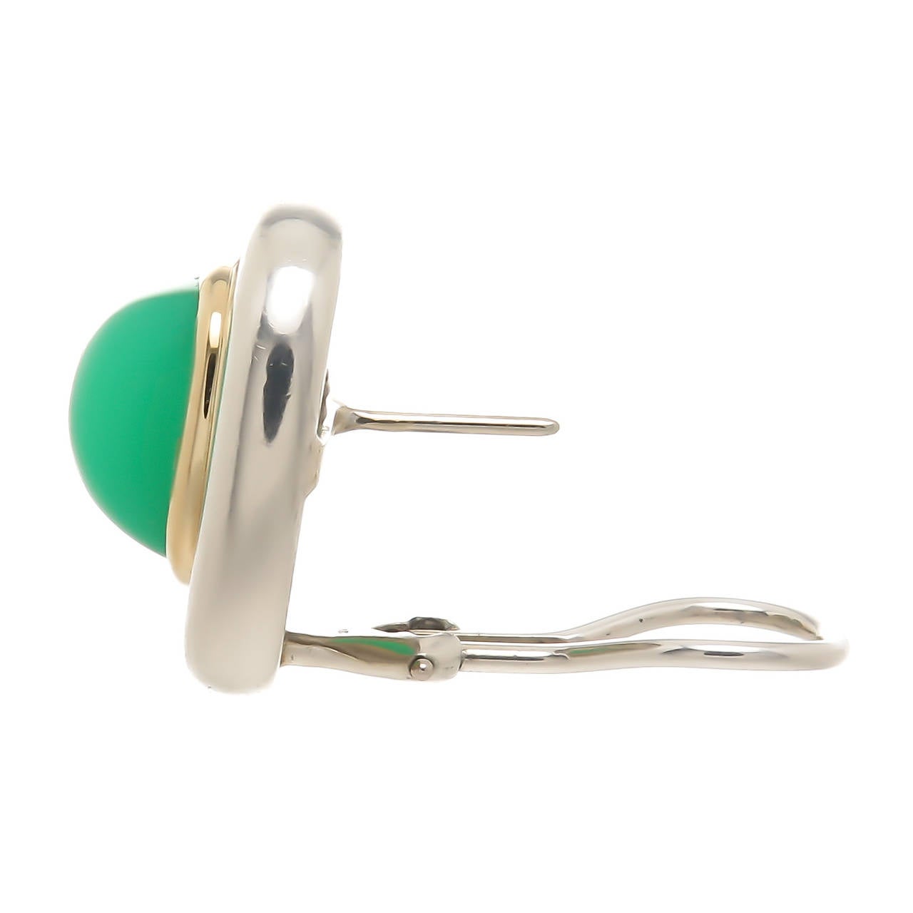 Circa 1980 Paloma Picasso for Tiffany & Company 18K Yellow Gold, Sterling Silver and Chrysoprase Earrings, centrally set with a domed fine Green Chrysoprase surrounded by a frame of Yellow Gold and set in sterling silver. Measuring 3/4  X  3/4 Inch.