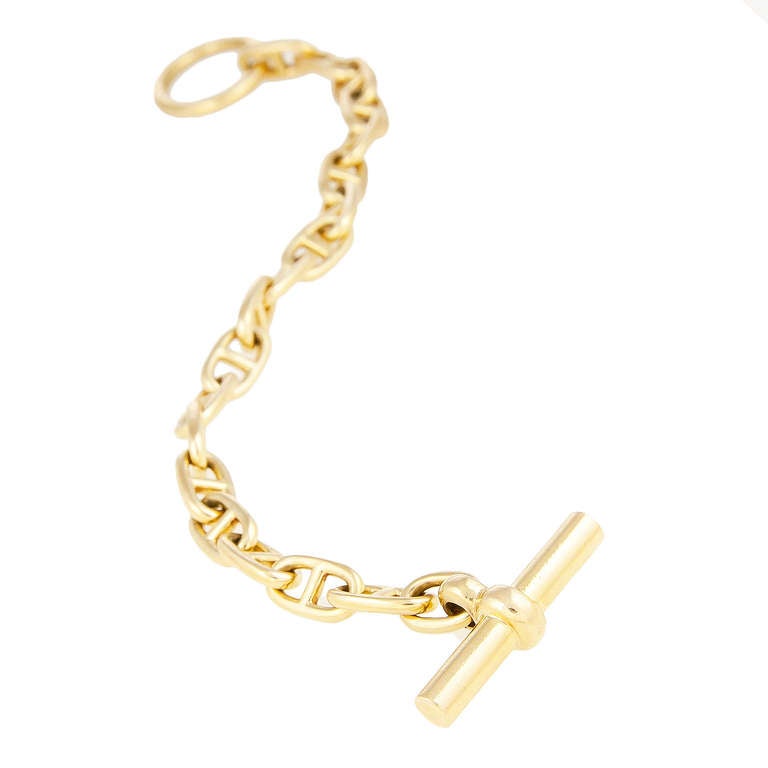 bracelet en or jaune 18 carats de la collection Chaine De Arch d'Hermès dans sa boîte d'origine.