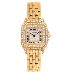 Cartier Montre-bracelet panthère pour femme en or jaune avec quartz et diamants