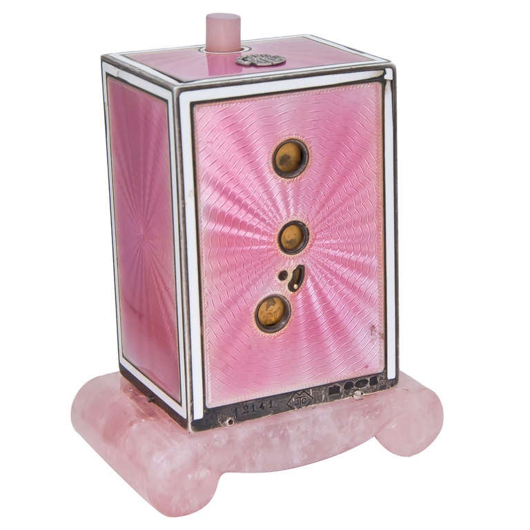 Geneve Clock Co., retailed by Cartier, sterling silver and pink guilloche enamel minute repeating desk clock, circa 1902s. Rose quartz base and thumb push button, diamond-set platinum hands and diamond-set platinum monogram to the top.