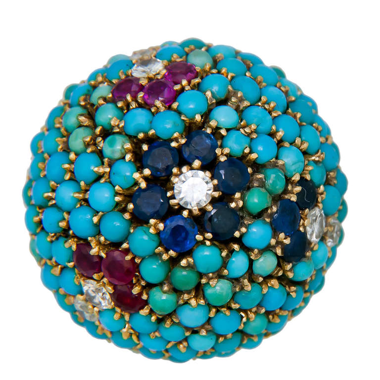 Circa 1960s 18K yellow Gold and Multi Gem set Petit Point Dome Ring. Predominately set with Turquoise, further set with Diamonds, Rubies and Sapphires. The Dome top measures 1 Inch in Diameter. Finger size = 6 1/2