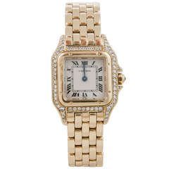 Cartier Lady's Yellow Gold and Diamond Panther Wristwatch circa 1990s